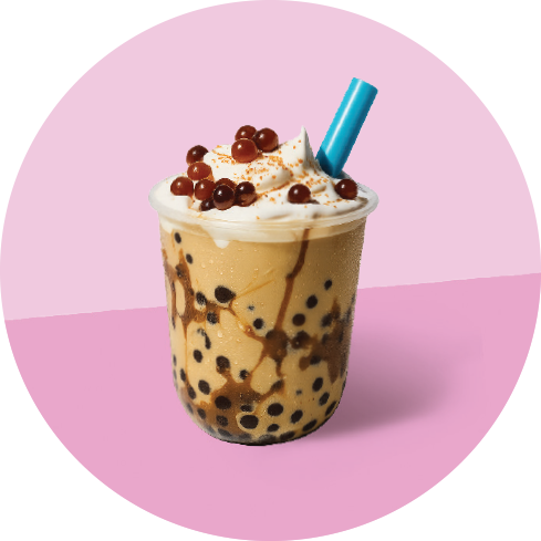 A bubble tea drink with tapioca pearls, whipped cream, and brown tapioca balls topped with small brown balls and a blue straw, on a pink background.