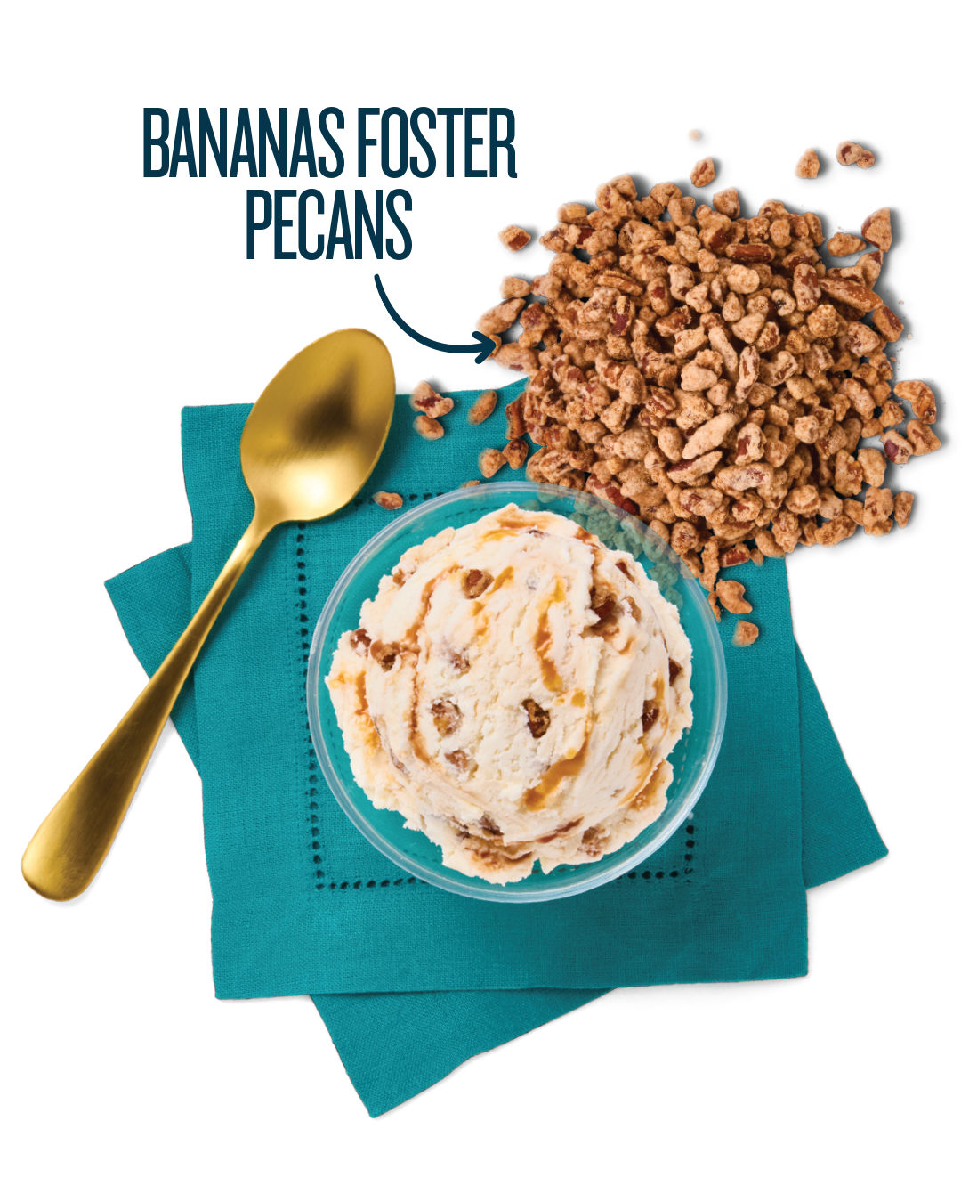 A scoop of butter pecan ice cream with visible pecans in a clear glass bowl, golden spoon, caramel syrup, chopped nuts on a black background, turquoise napkins underneath.