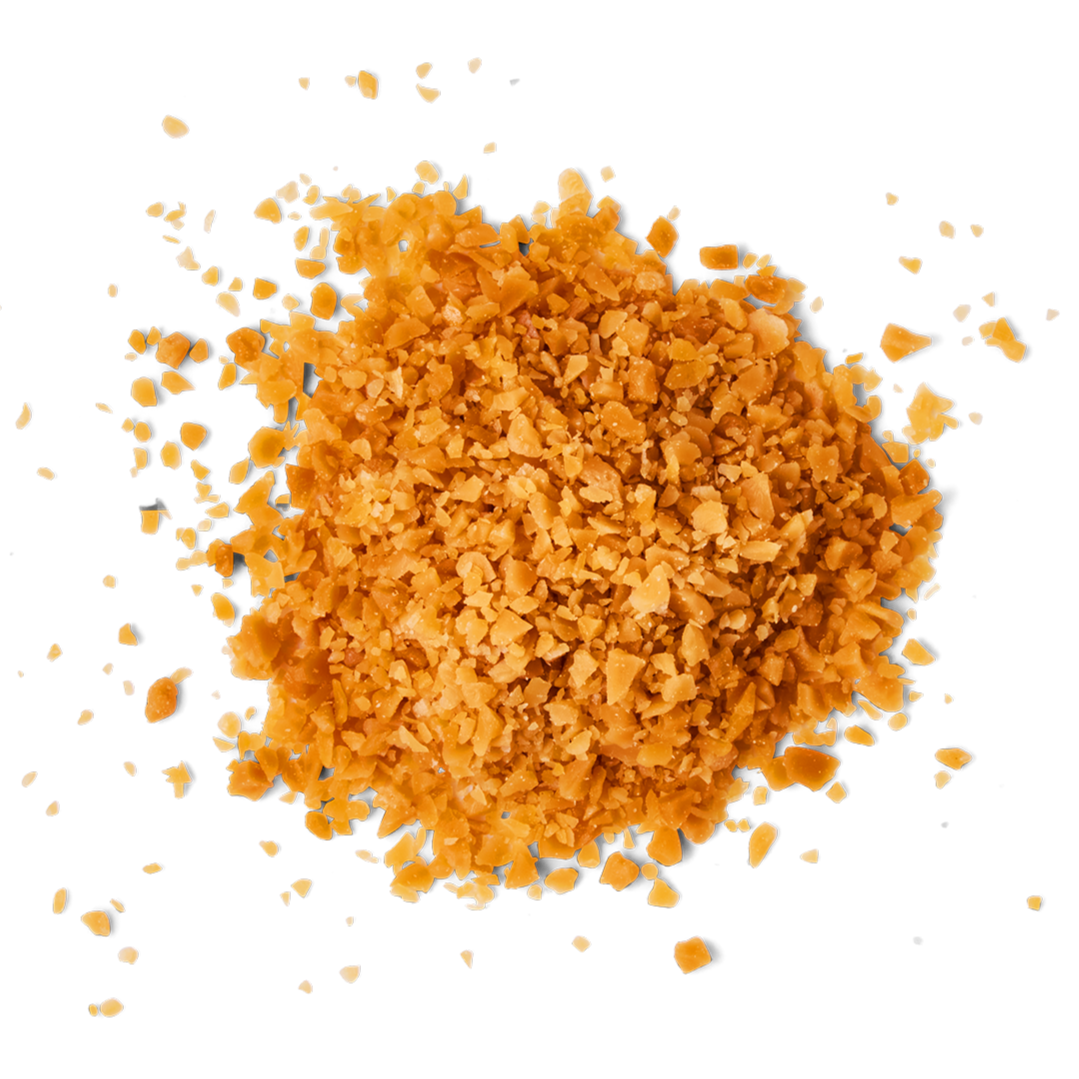 Close-up of a pile of crushed orange-colored cheese crackers.