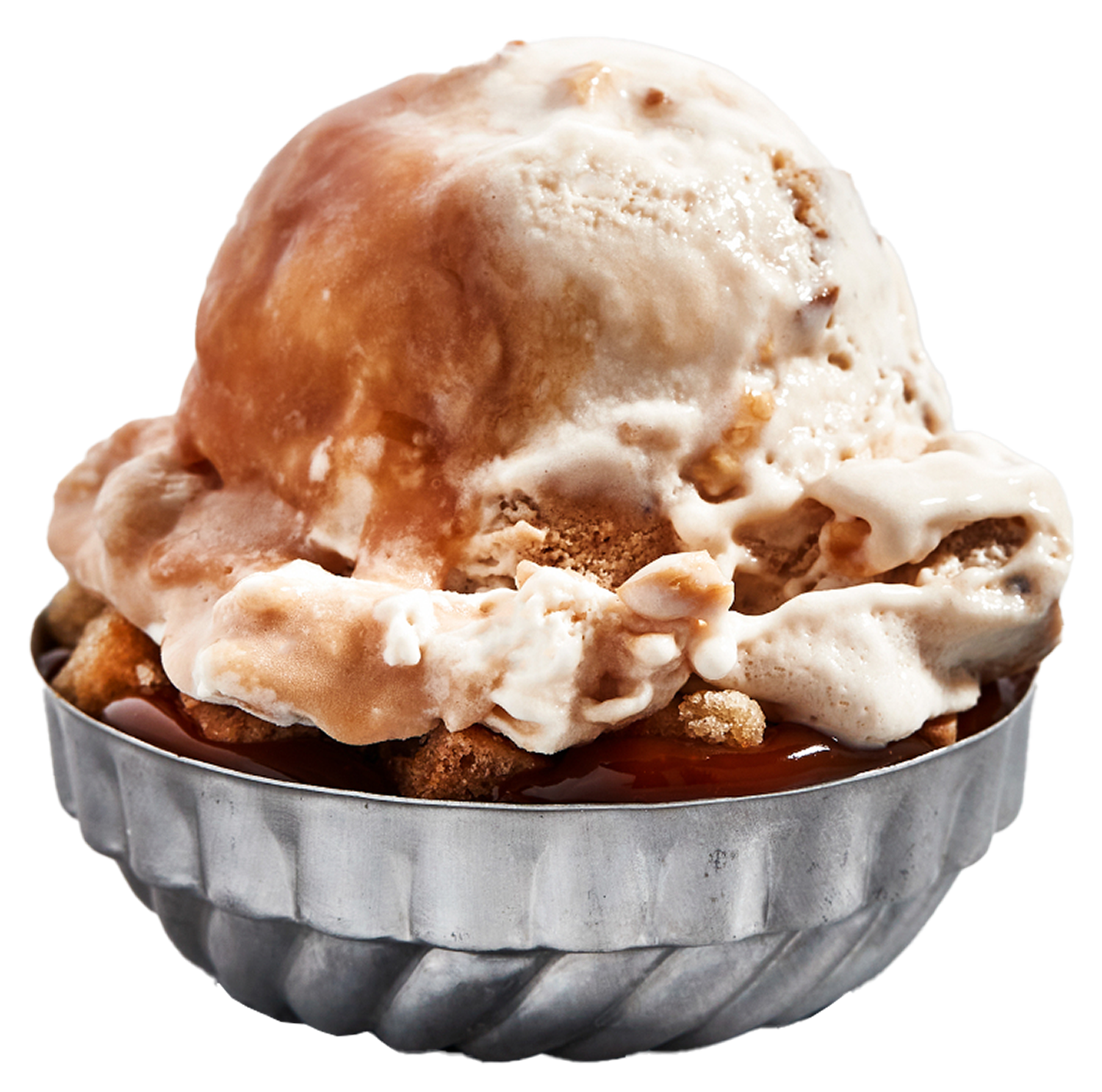 A scoop of vanilla ice cream in a metal bowl, topped with caramel sauce and whipped cream.