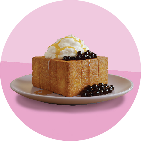 Deep-fried dessert topped with whipped cream, brown sugar syrup, and black tapioca pearls on a white plate