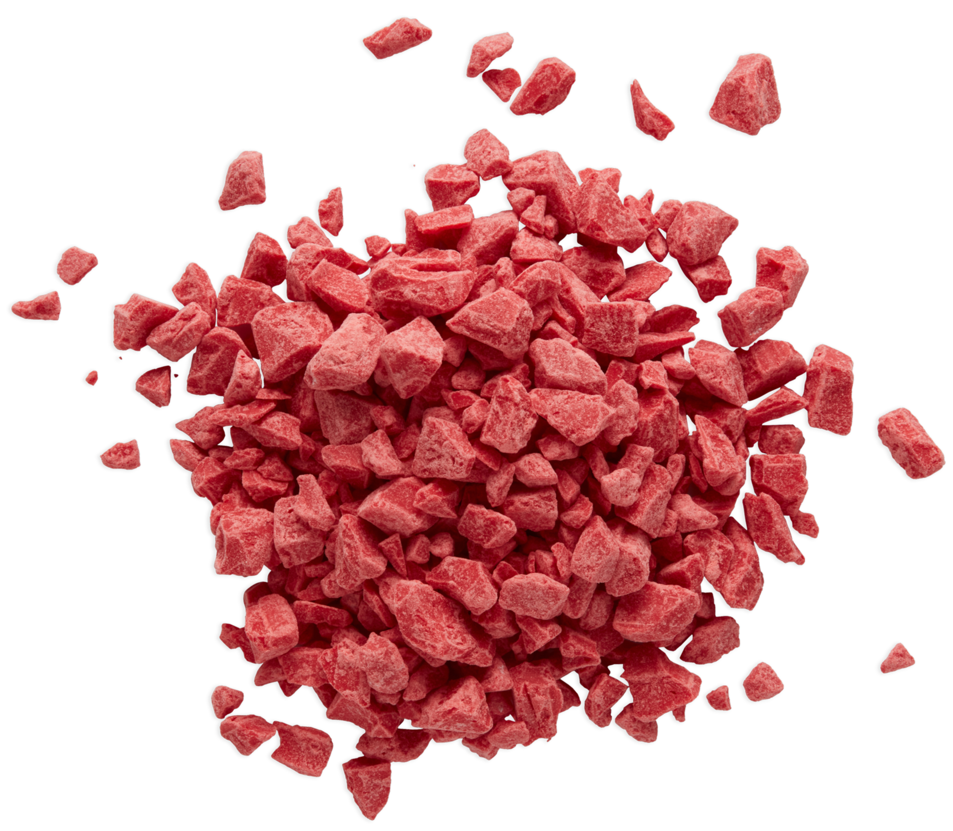 Pink rock salt crystals scattered on a black background