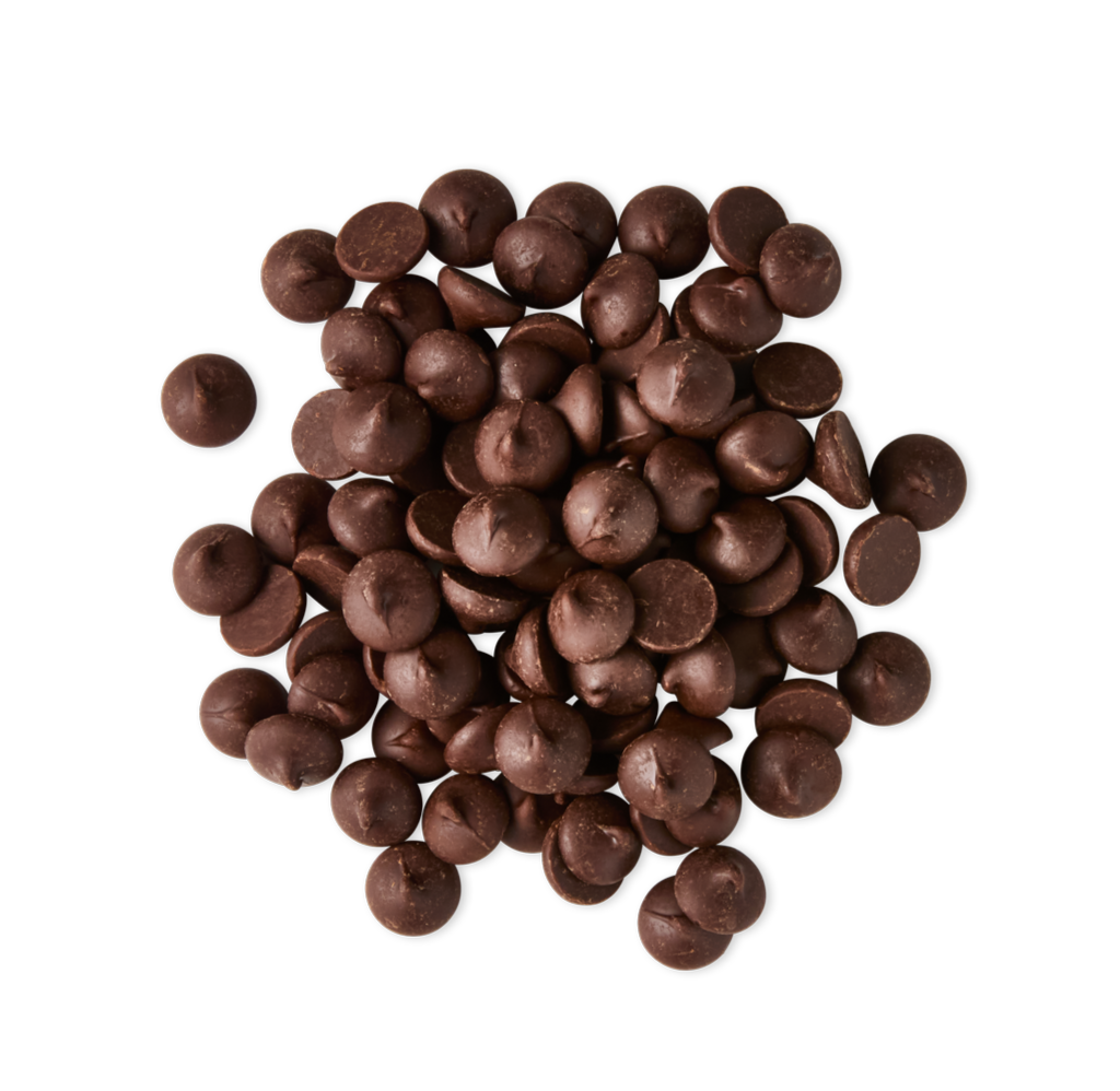 A pile of small chocolate chips scattered on a black background.