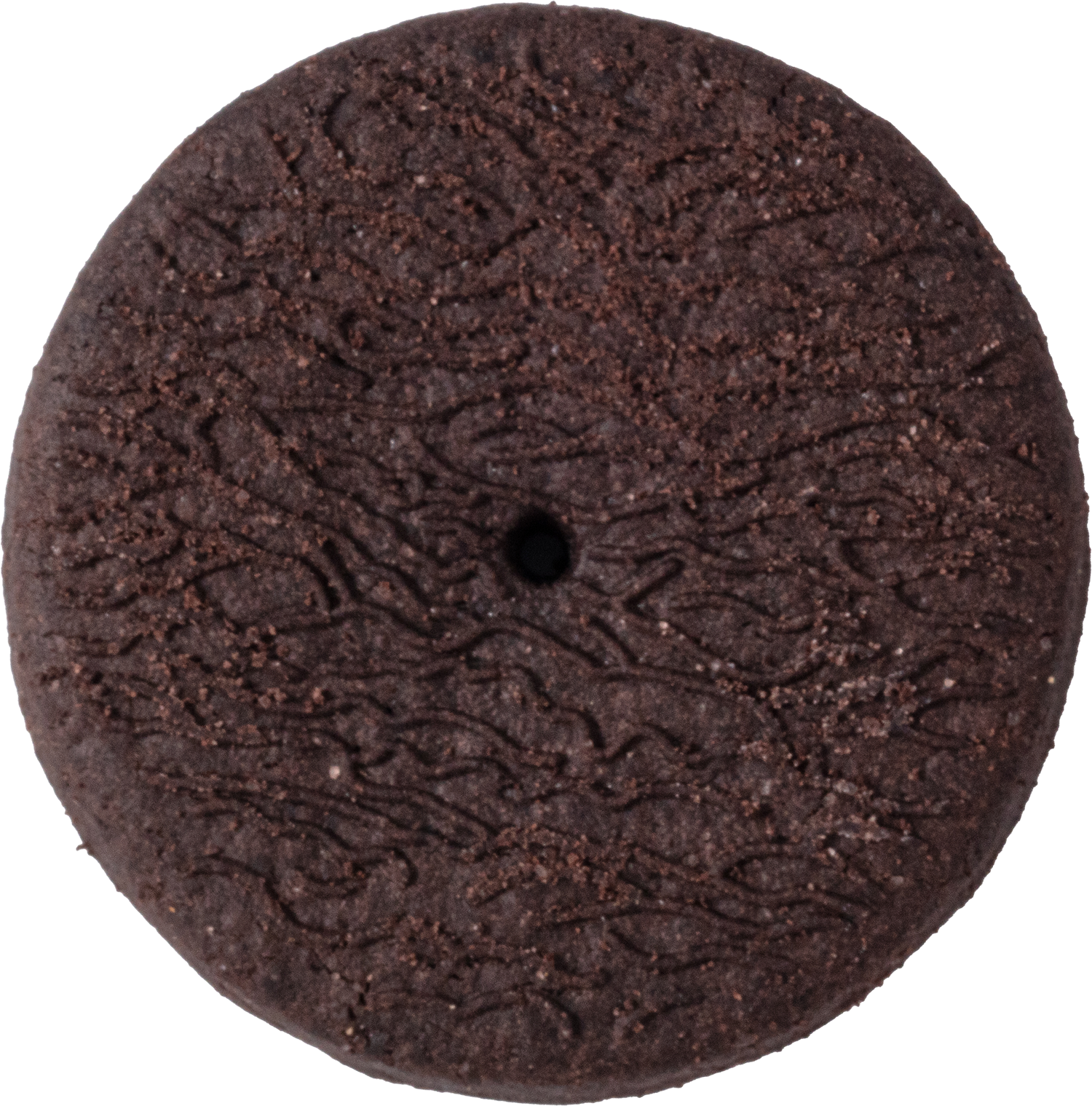 Close-up of a round, dark brown chocolate cookie with a textured surface and a small central hole.