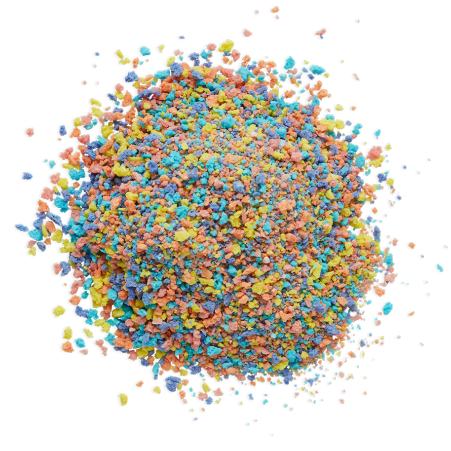Colorful crushed candy sprinkles scattered on a black background.
