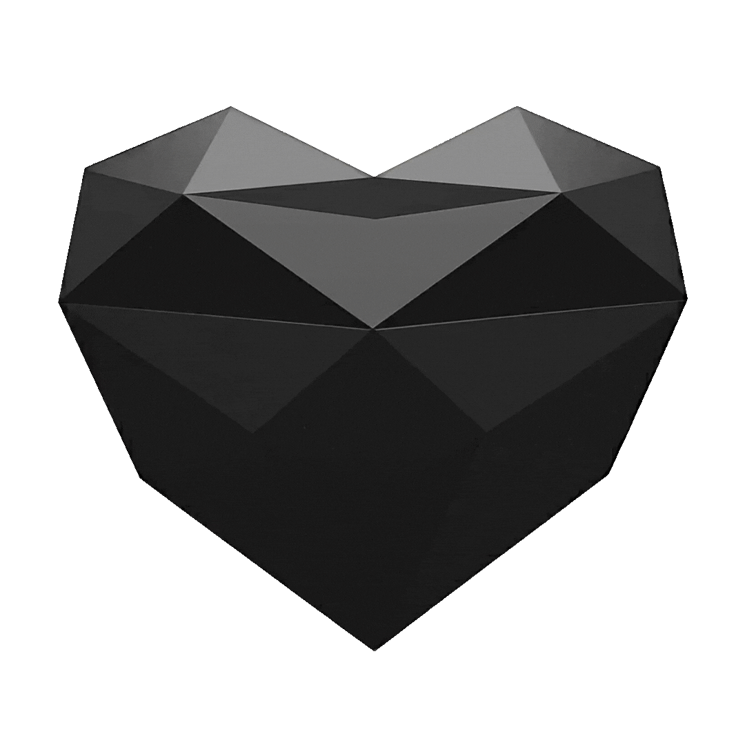 Black, faceted, heart-shaped gemstone or sculpture against a gray background.