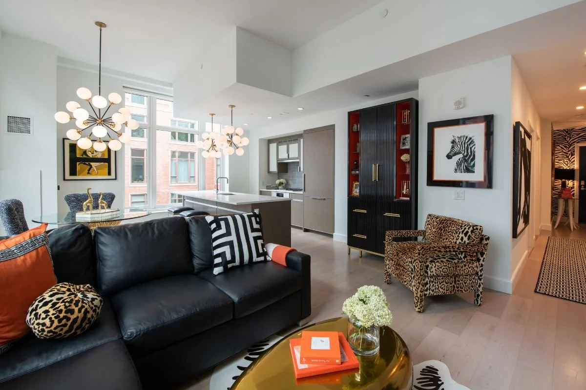 Bold red and black open concept living space in Boston Warf condo