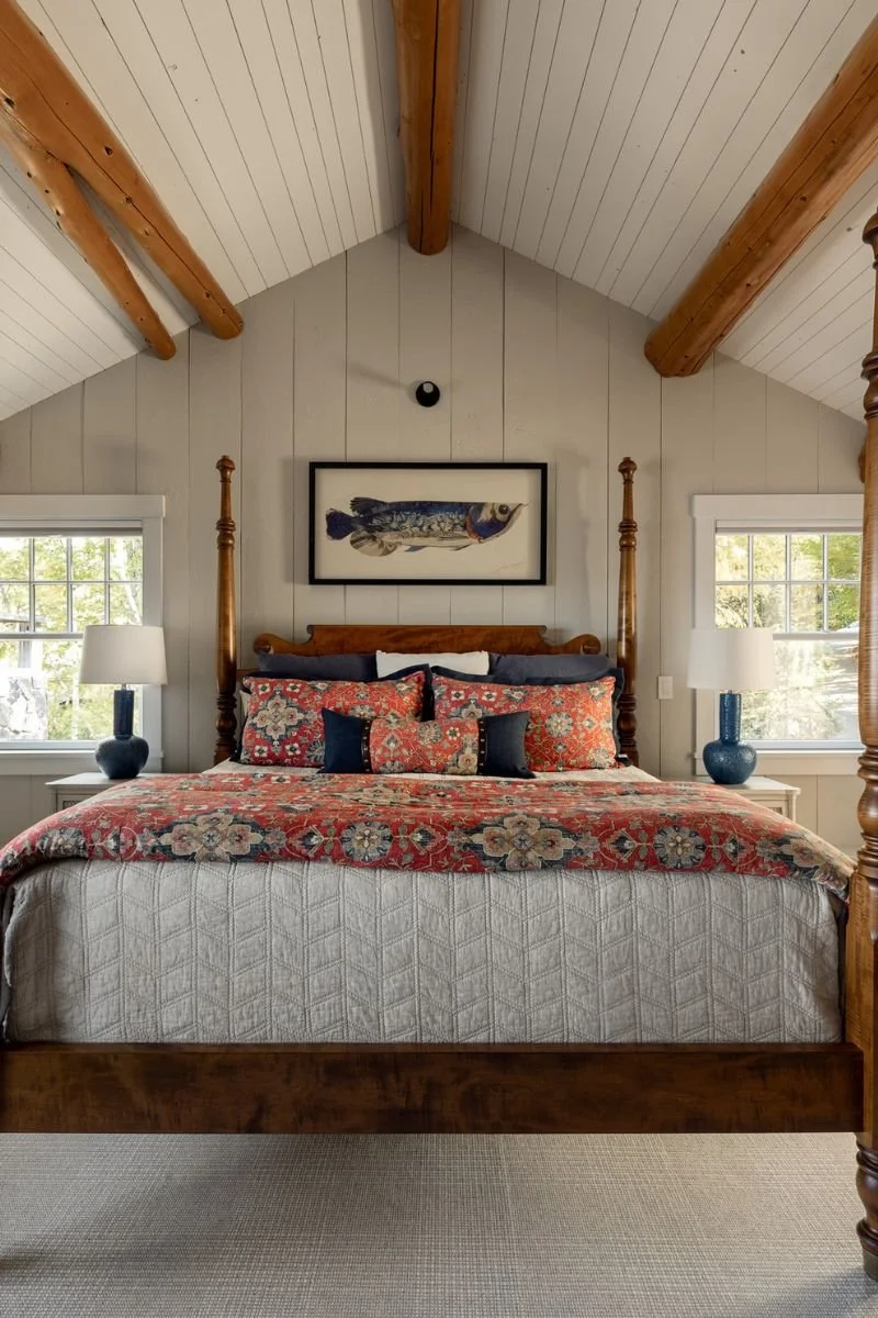 Light filled dormer bedroom, white shiplap and natural wood beams.