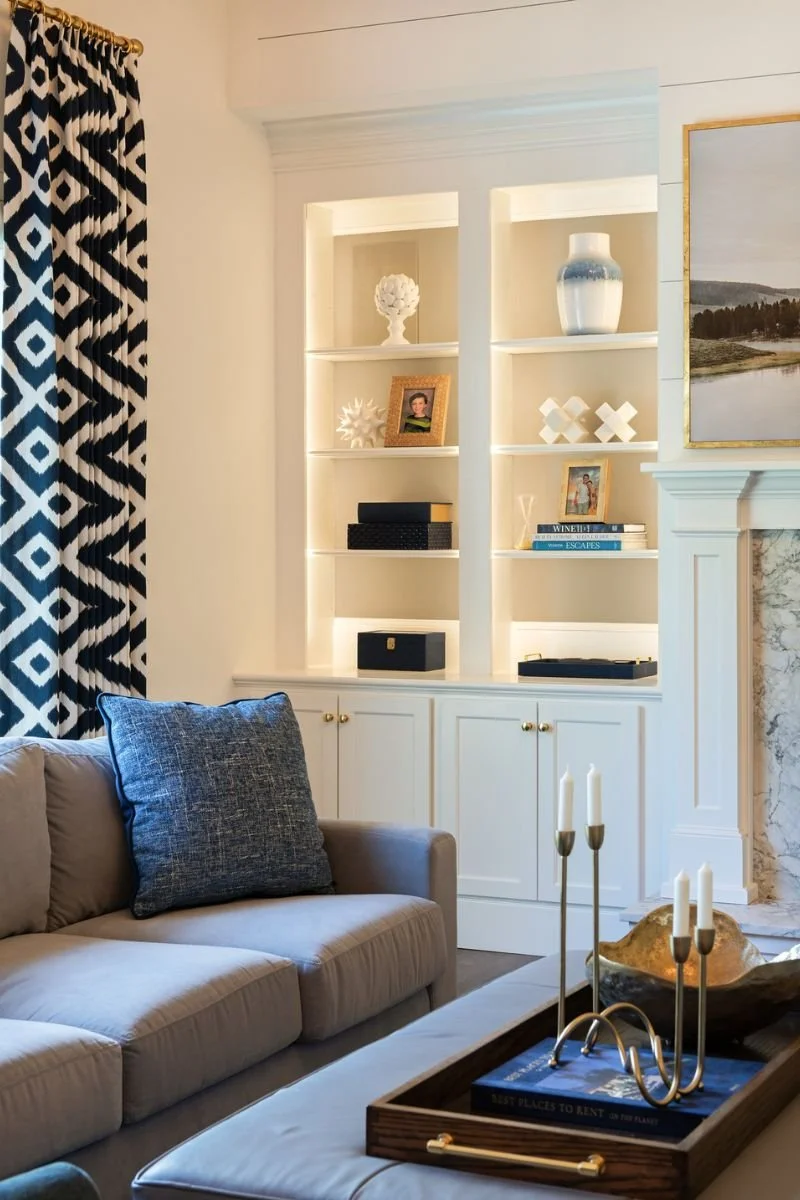 Custom built in bookcase with integrated lighting in sitting room