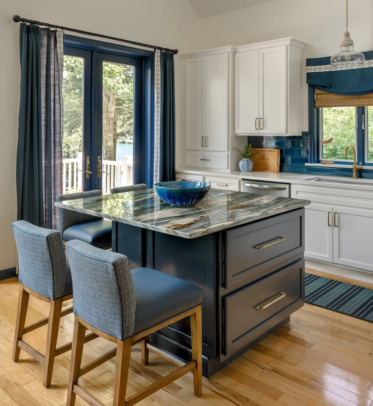 Blue and white kitchen with newly added center island.
