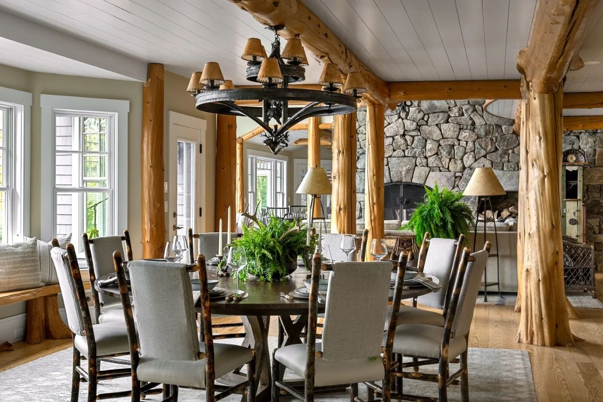 Large round dining table in rustic lodge