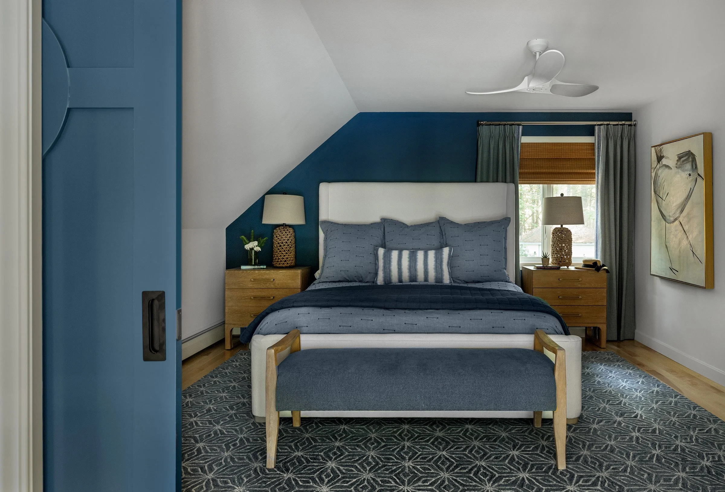 Primary bedroom with custom pocket doors