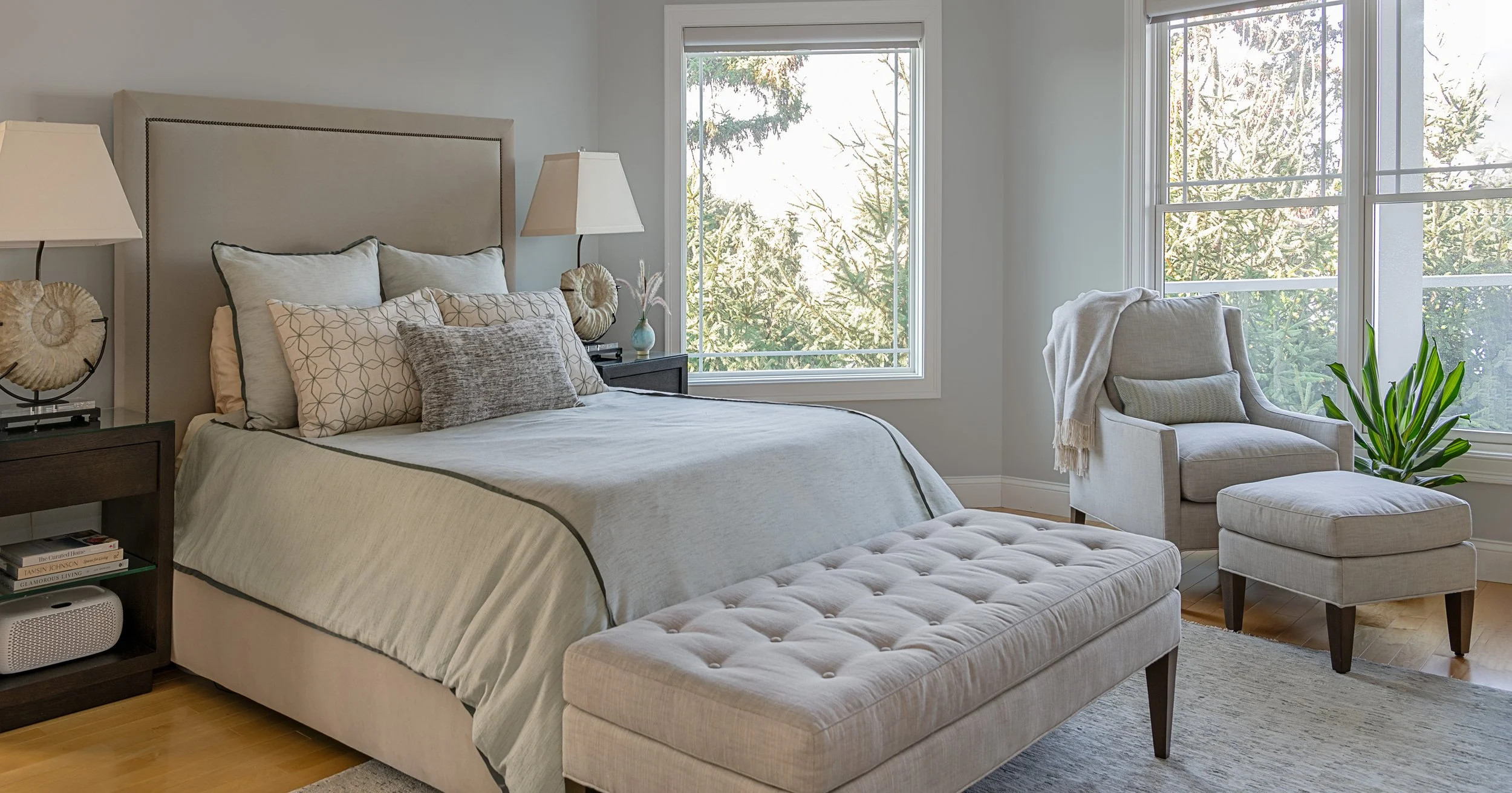 Bright coastal themed bedroom from an angle