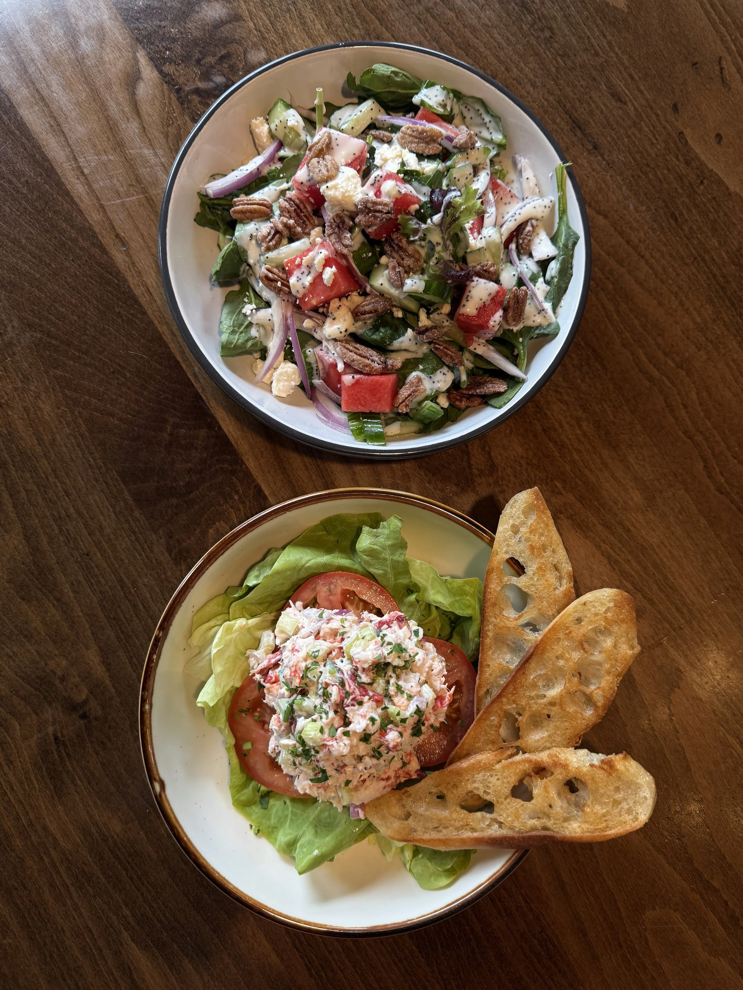 lobster salad and a fresh watermelon summer salad with spinach and chicken gluten free