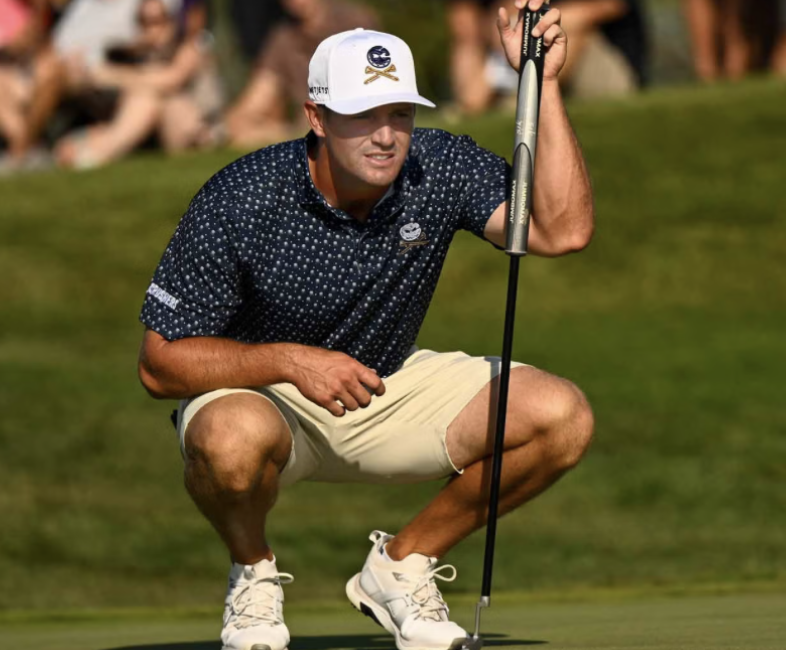 Golfer showing confident body language and mental reset on tee box