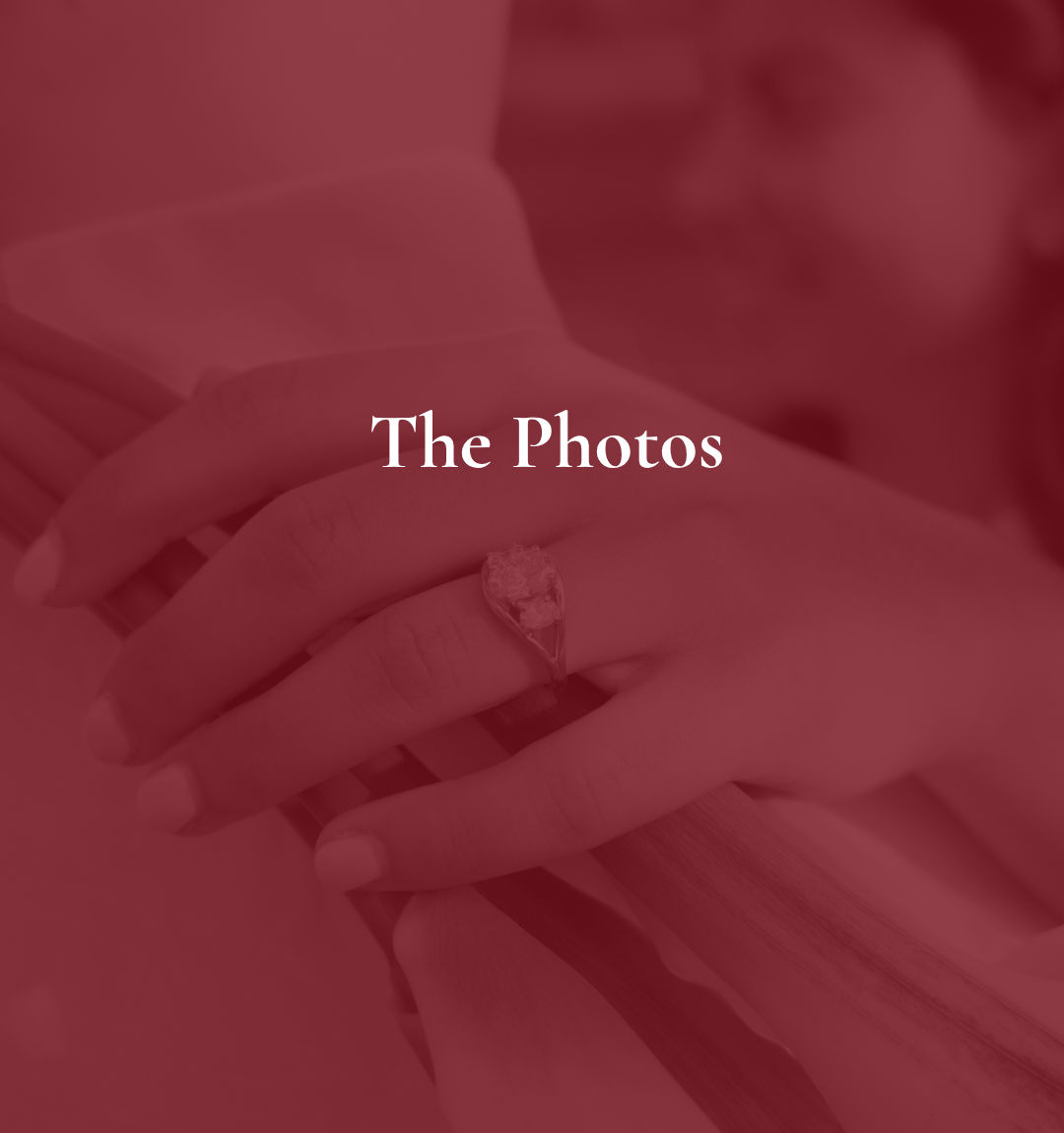Close-up of a woman wearing a ring on her finger, with her hand resting on her chin, with the text 'The Photos' overlayed.