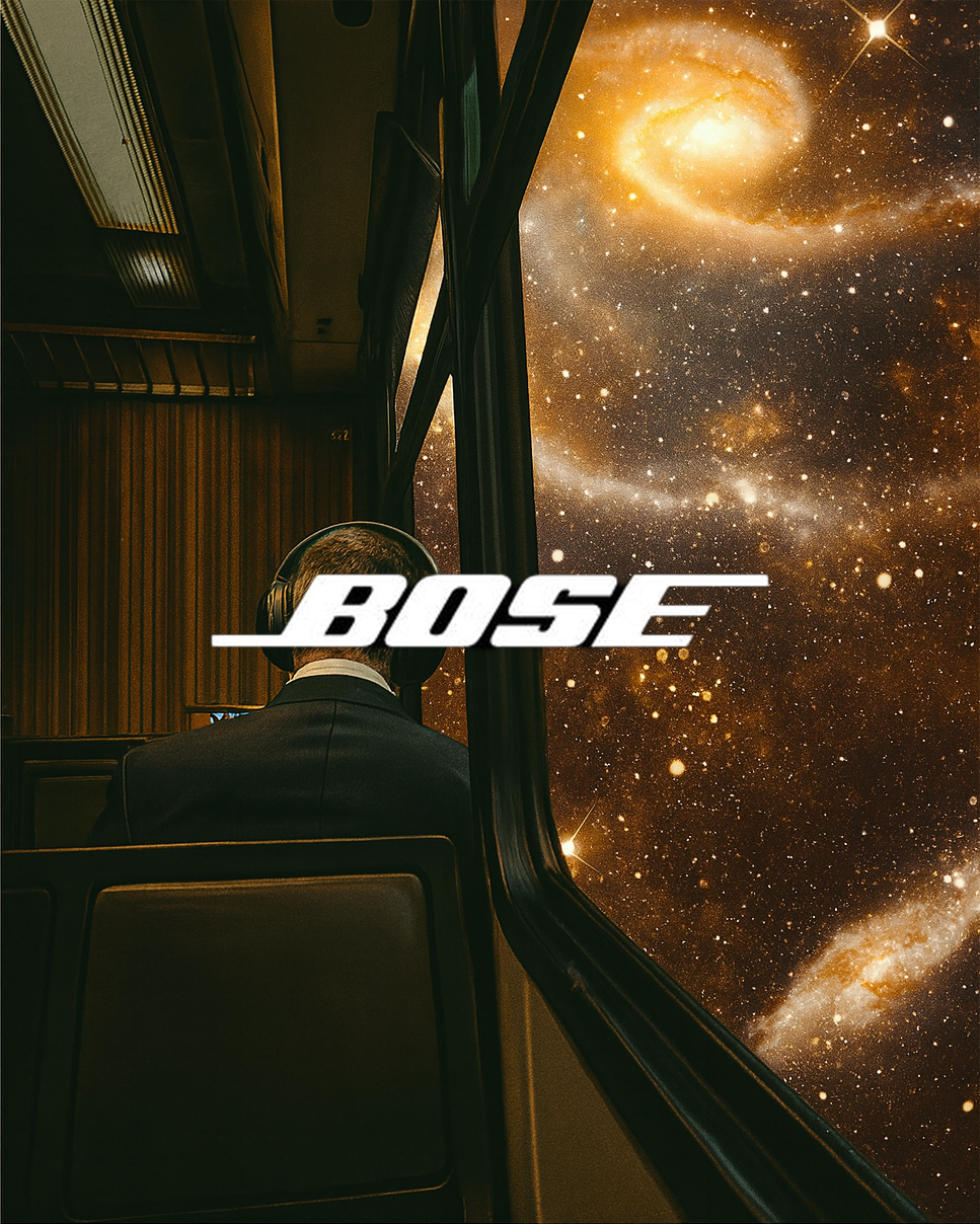 A person sitting inside a bus or train with headphones, looking out the window at a view of outer space filled with stars and galaxies, with a Bose logo overlaid.