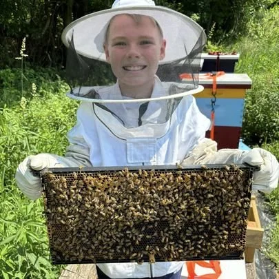 AJ honey harvest.jpg