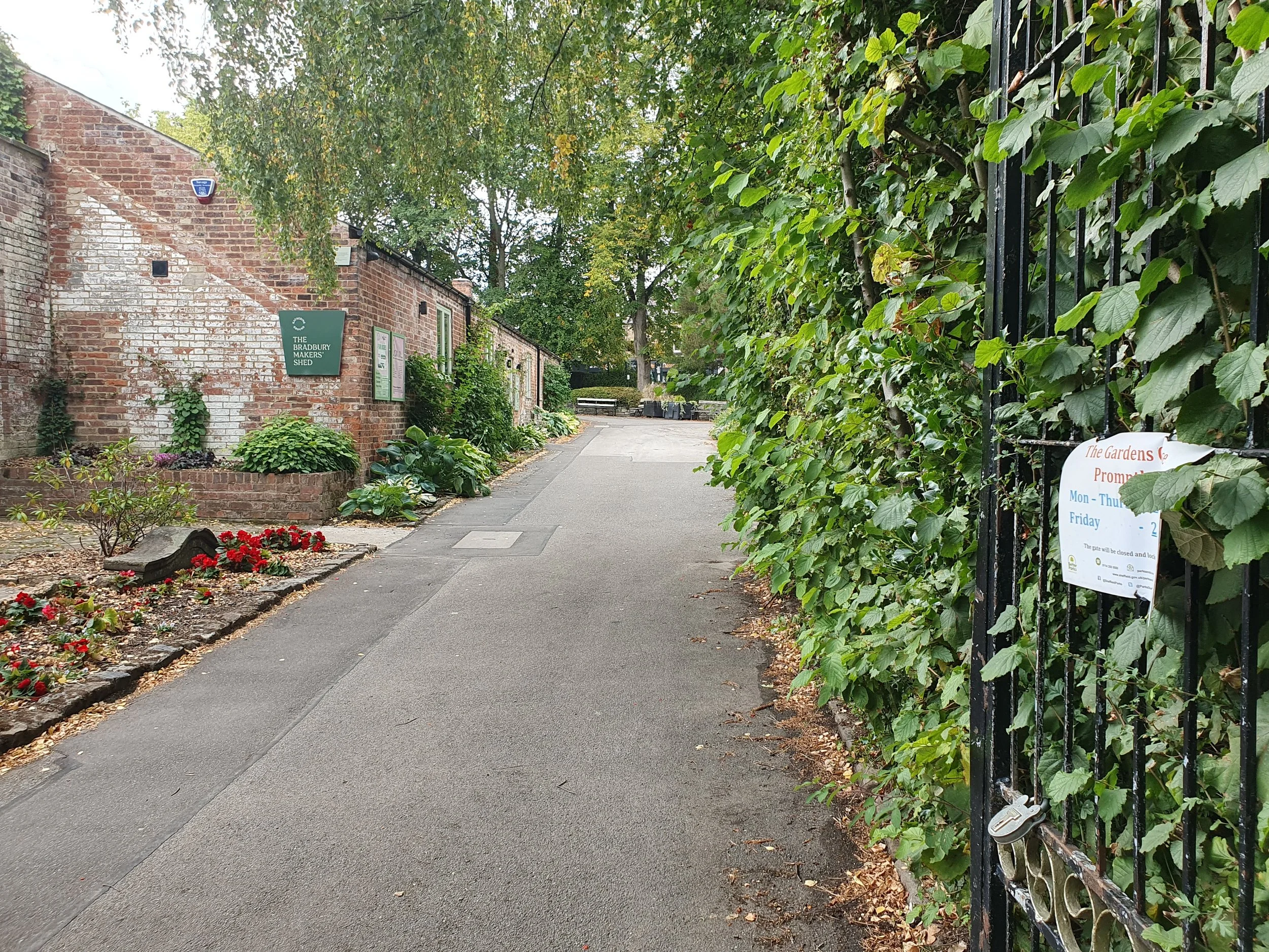 After you turn right, with the cafe on your left, keep going through these iron gates. The Bradbury Maker's Shed is this building ahead on the left.