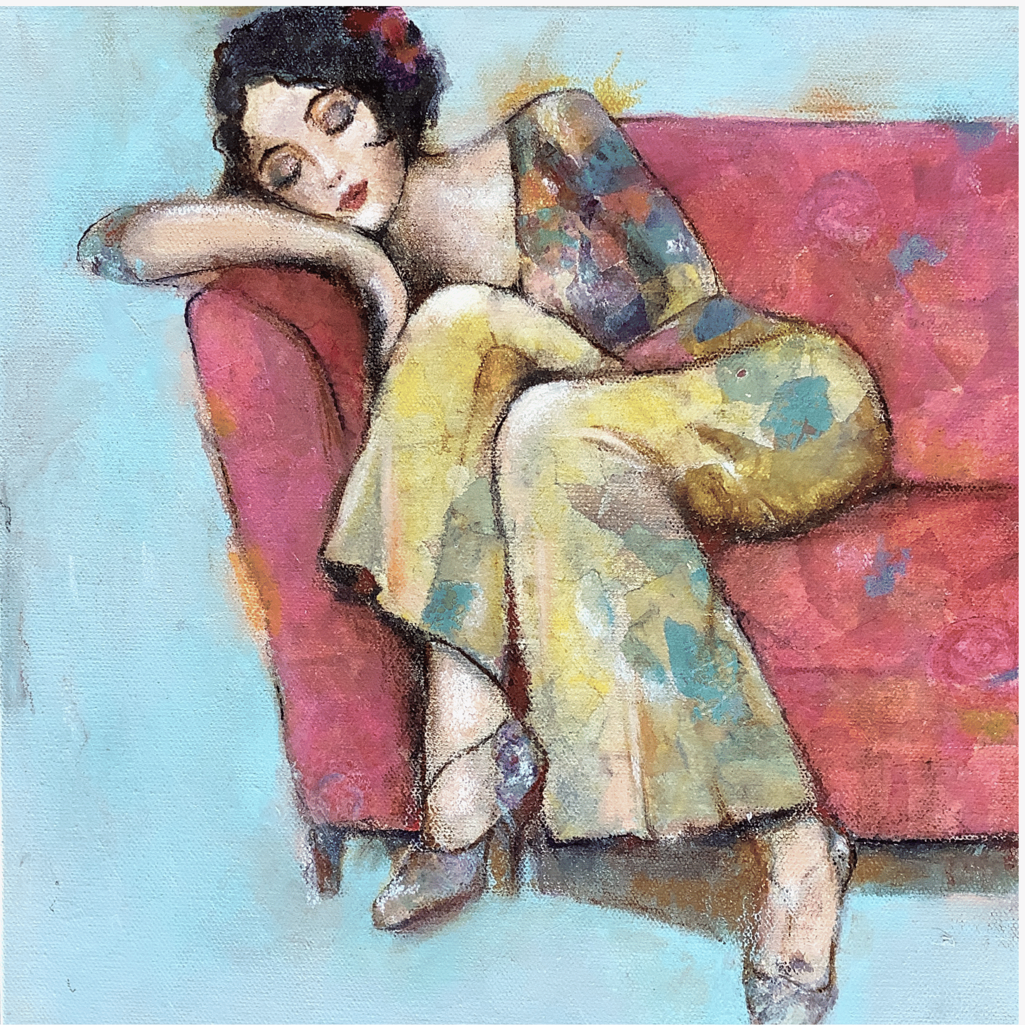 woman in colorful yellow outfit resting her head on red couch