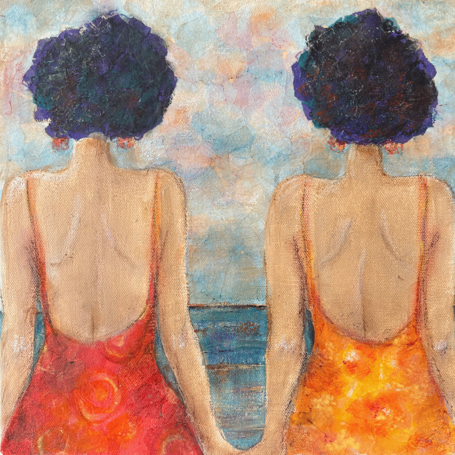 two women wearing red and yellow swimsuits sit side by side back to viewer
