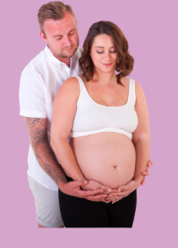Paige and her husband during her pregnancy.