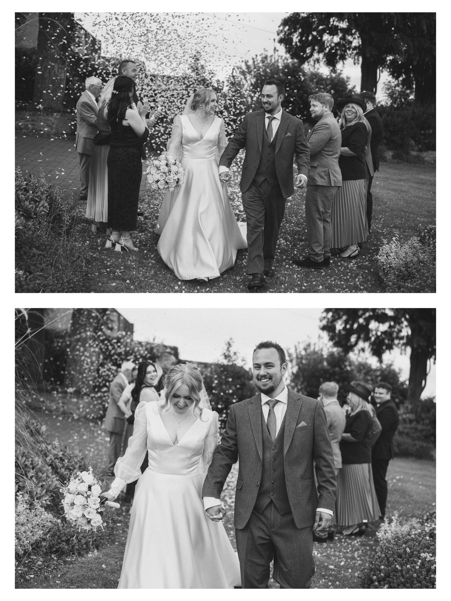 Black and white photo of a bride and groom walking hand in hand outdoors during a wedding celebration. The bride is holding a bouquet of flowers and smiling, while the groom is dressed in a suit and smiling. Guests are clapping and celebrating in the
