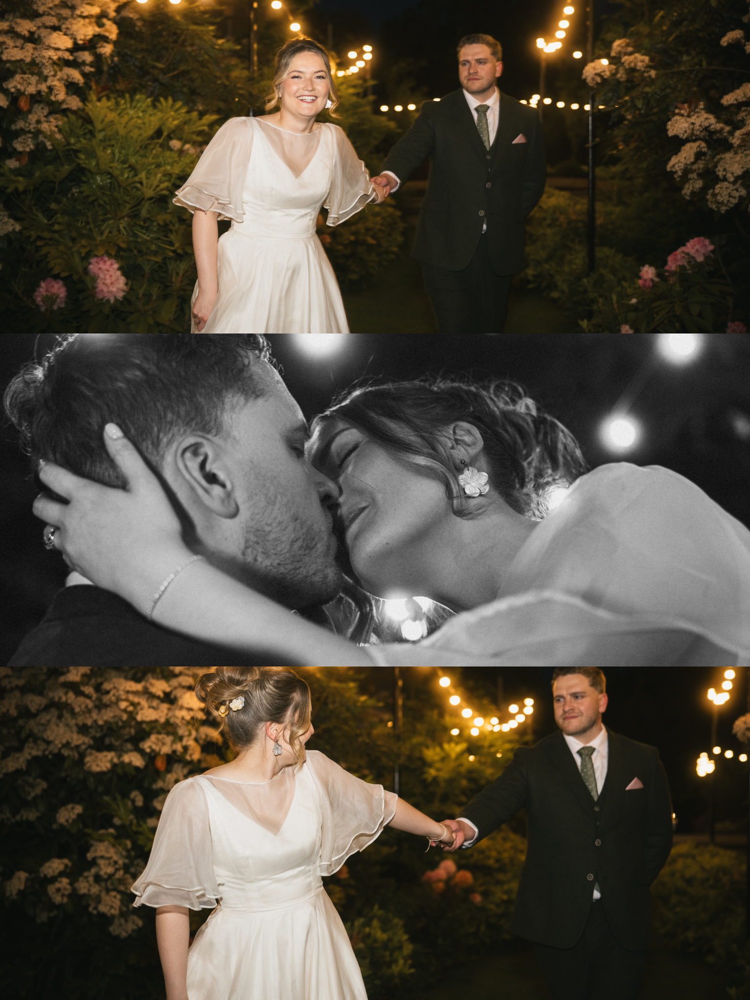 A bride and groom holding hands, dancing at night outdoors with string lights and bushes in the background. The bride is smiling, wearing a cream-colored dress with sheer sleeves, and the groom is serious, wearing a dark suit with a tie.