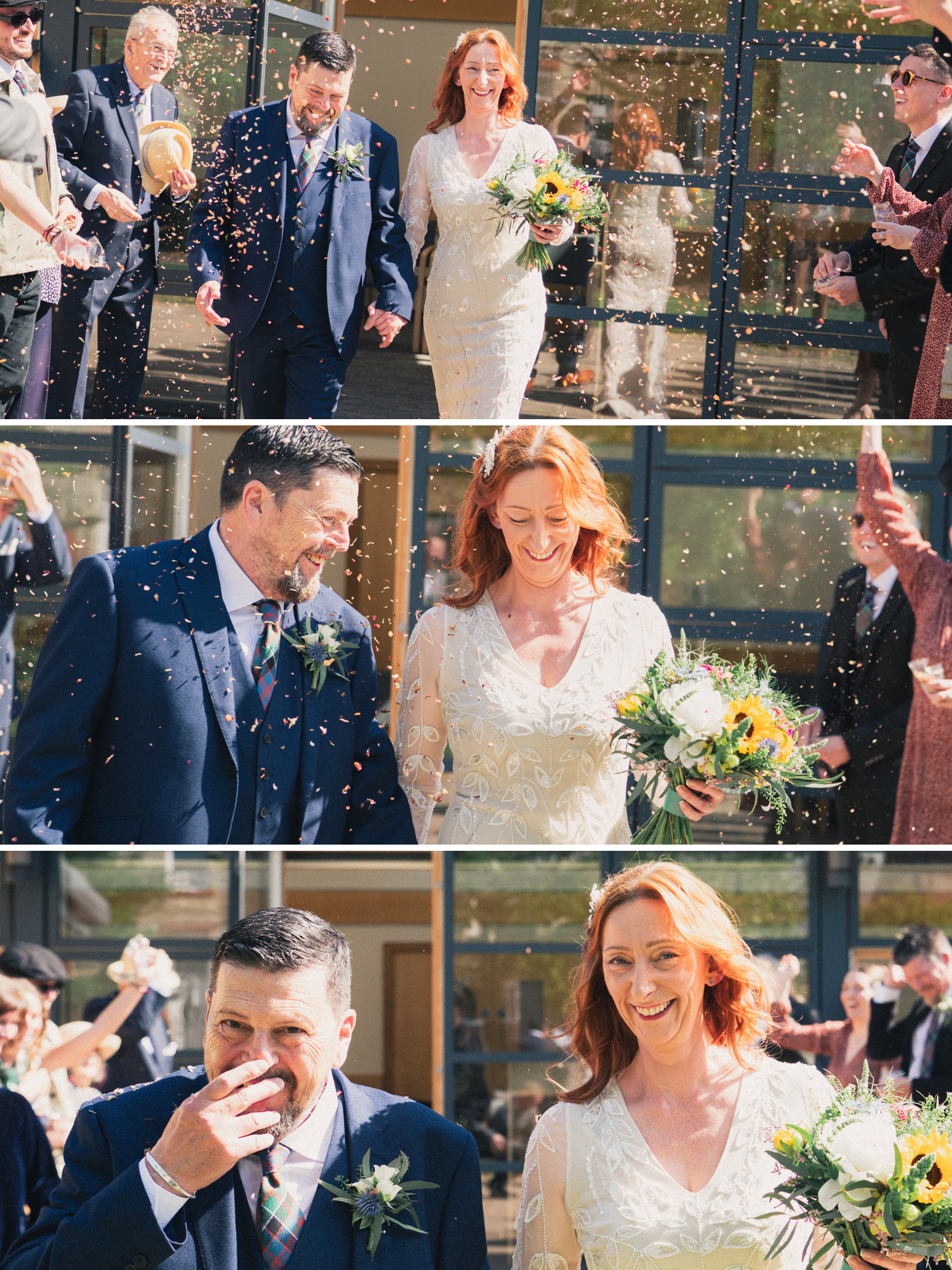 A wedding celebration with a bride in a white dress holding a bouquet of flowers and a groom in a dark suit. They are walking outdoors, smiling, as confetti is thrown around them by family and friends. The background shows a modern building with glas