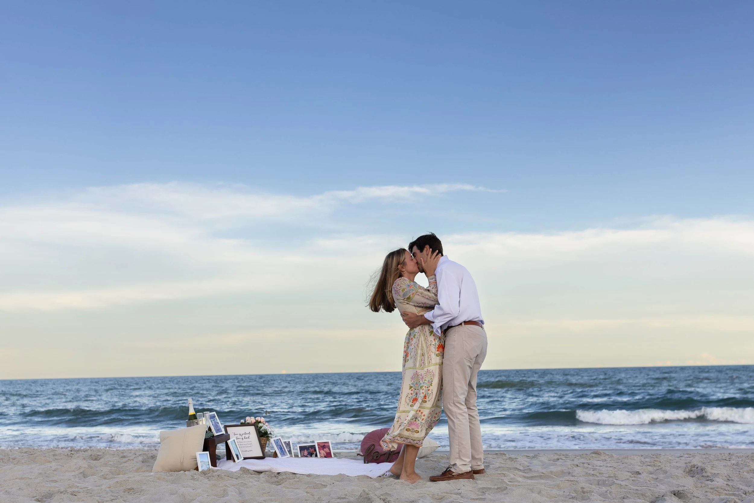 Pawleys Island proposal photography featuring a romantic beach engagement, champagne celebration