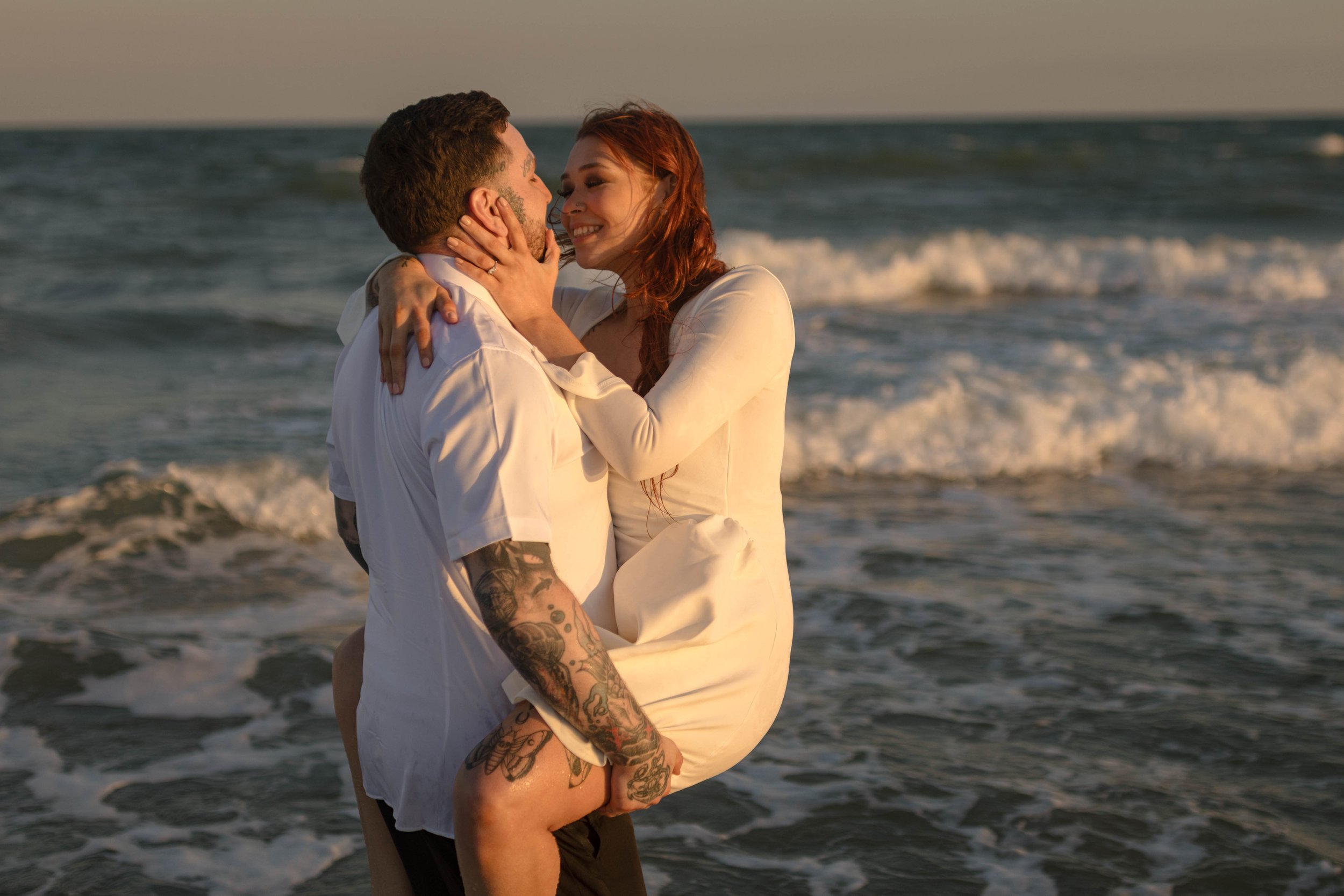 Creative couples portrait in dreamy golden light on Myrtle Beach shoreline