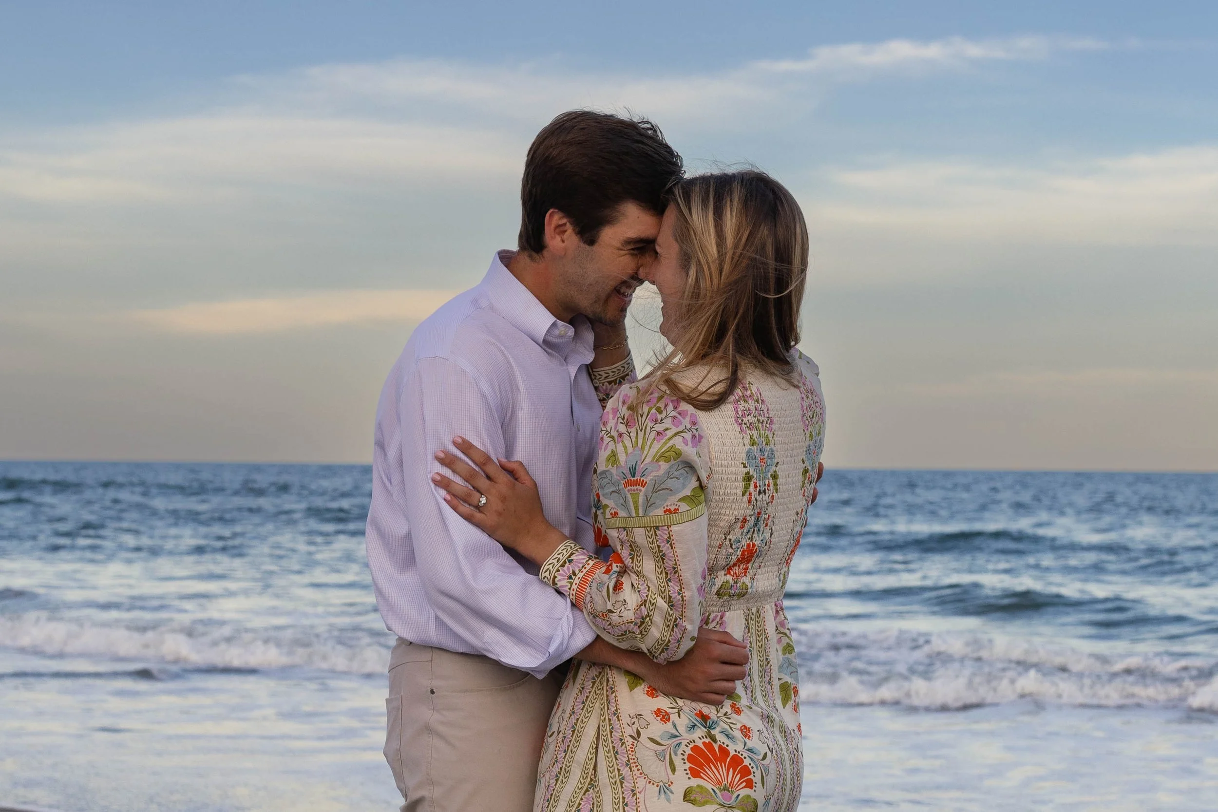 Pawleys Island proposal photography featuring a romantic beach engagement, champagne celebration