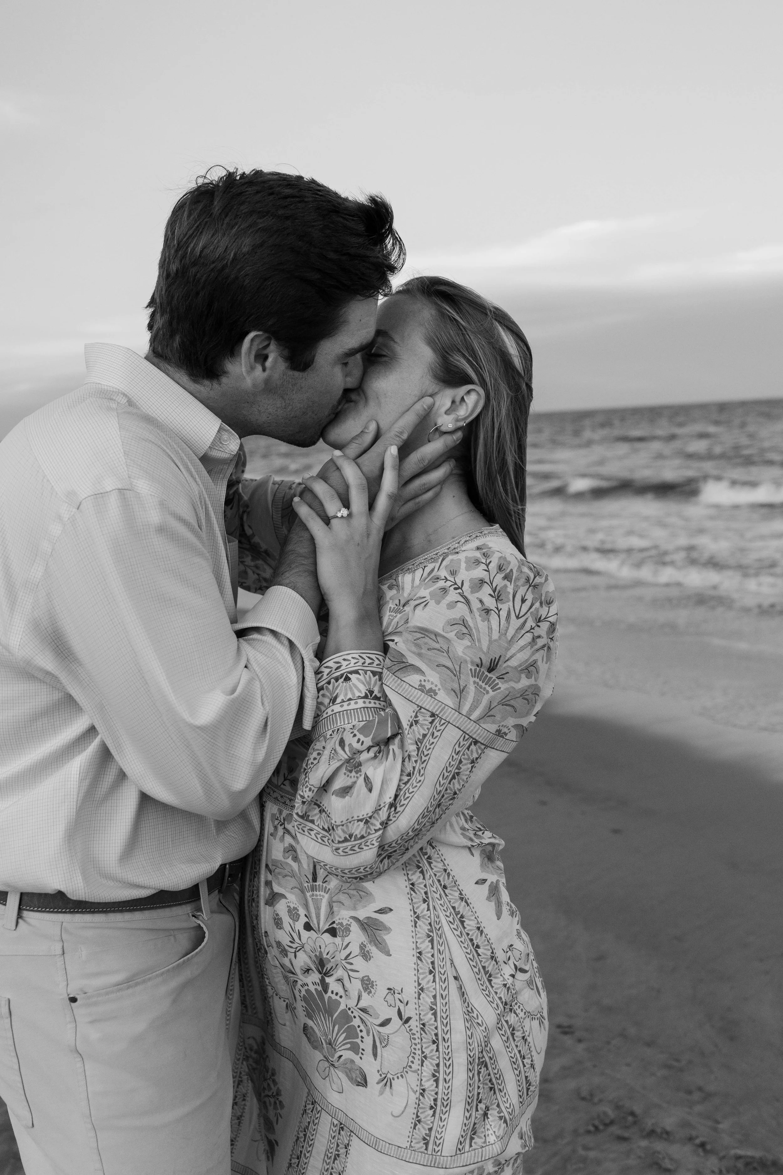 Pawleys Island proposal photography featuring a romantic beach engagement, champagne celebration