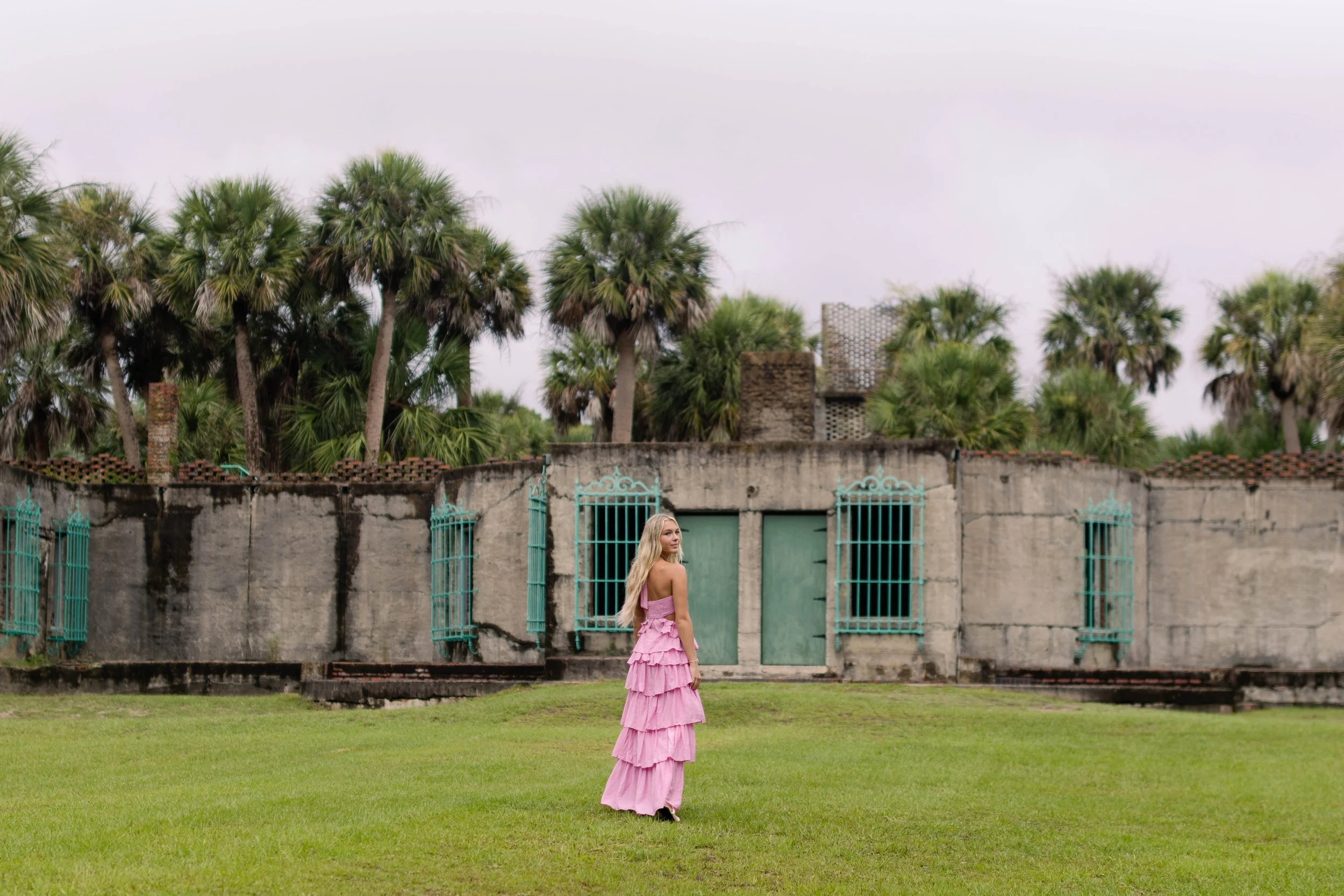 Huntington Beach State Park with a Myrtle Beach senior photographer. Greenery, Atalaya Castle, and beach views