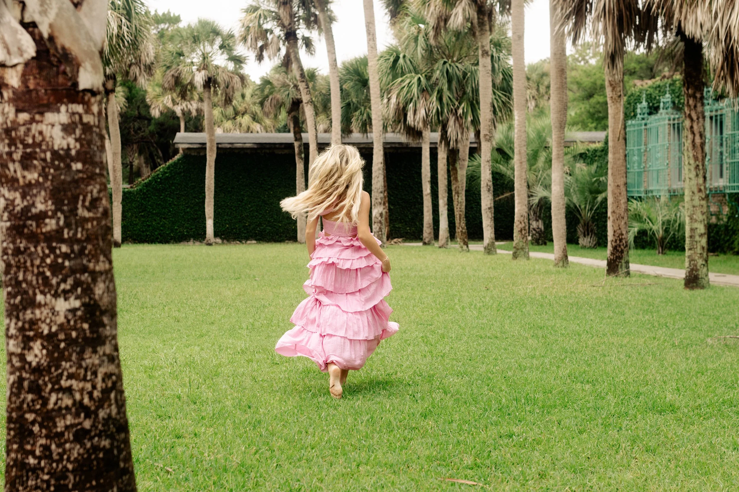 Huntington Beach State Park with a Myrtle Beach senior photographer. Greenery, Atalaya Castle, and beach views