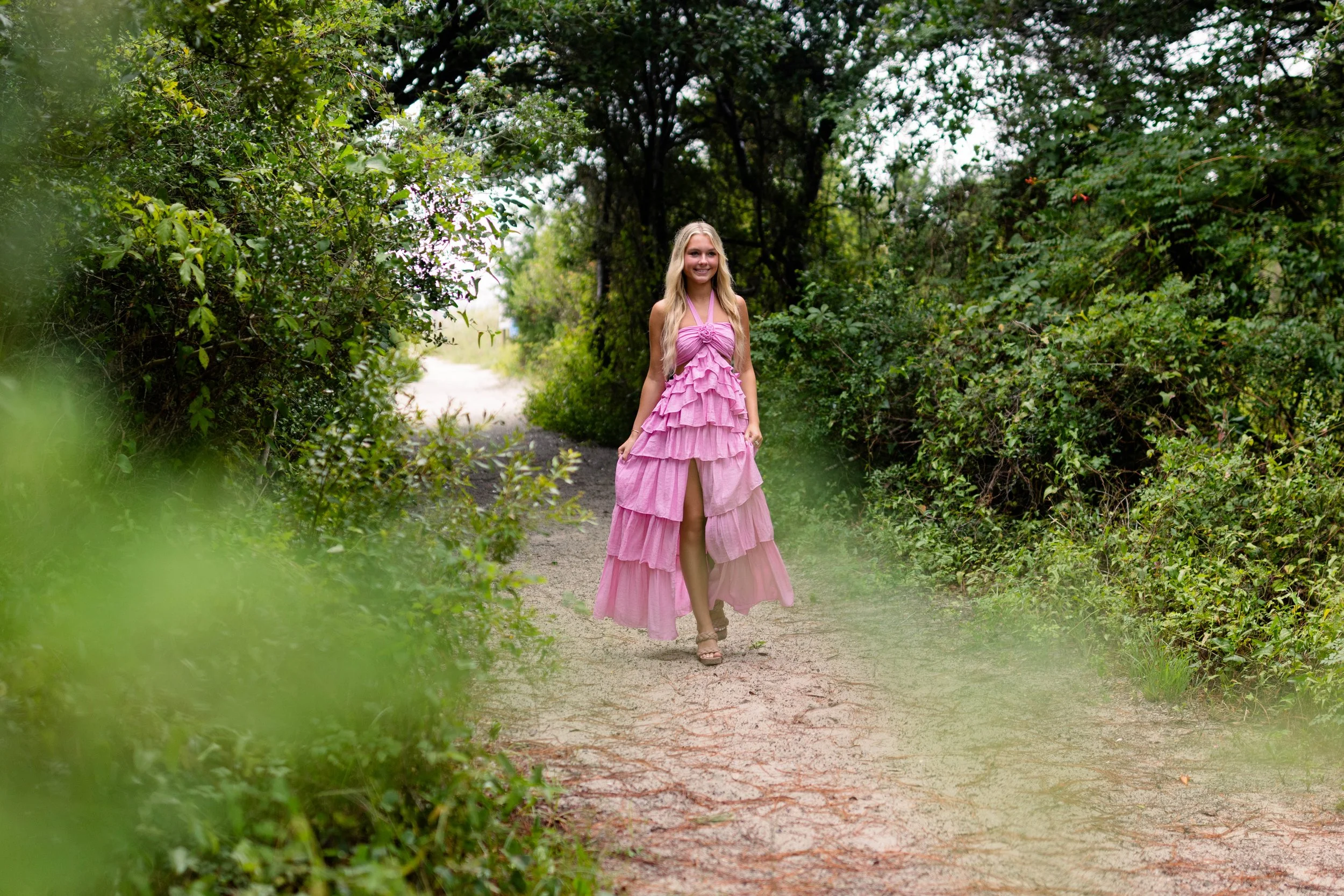 Huntington Beach State Park with a Myrtle Beach senior photographer. Greenery, Atalaya Castle, and beach views