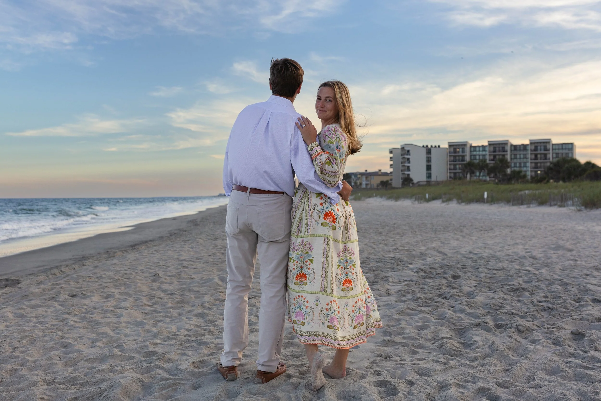 Pawleys Island proposal photography featuring a romantic beach engagement, champagne celebration