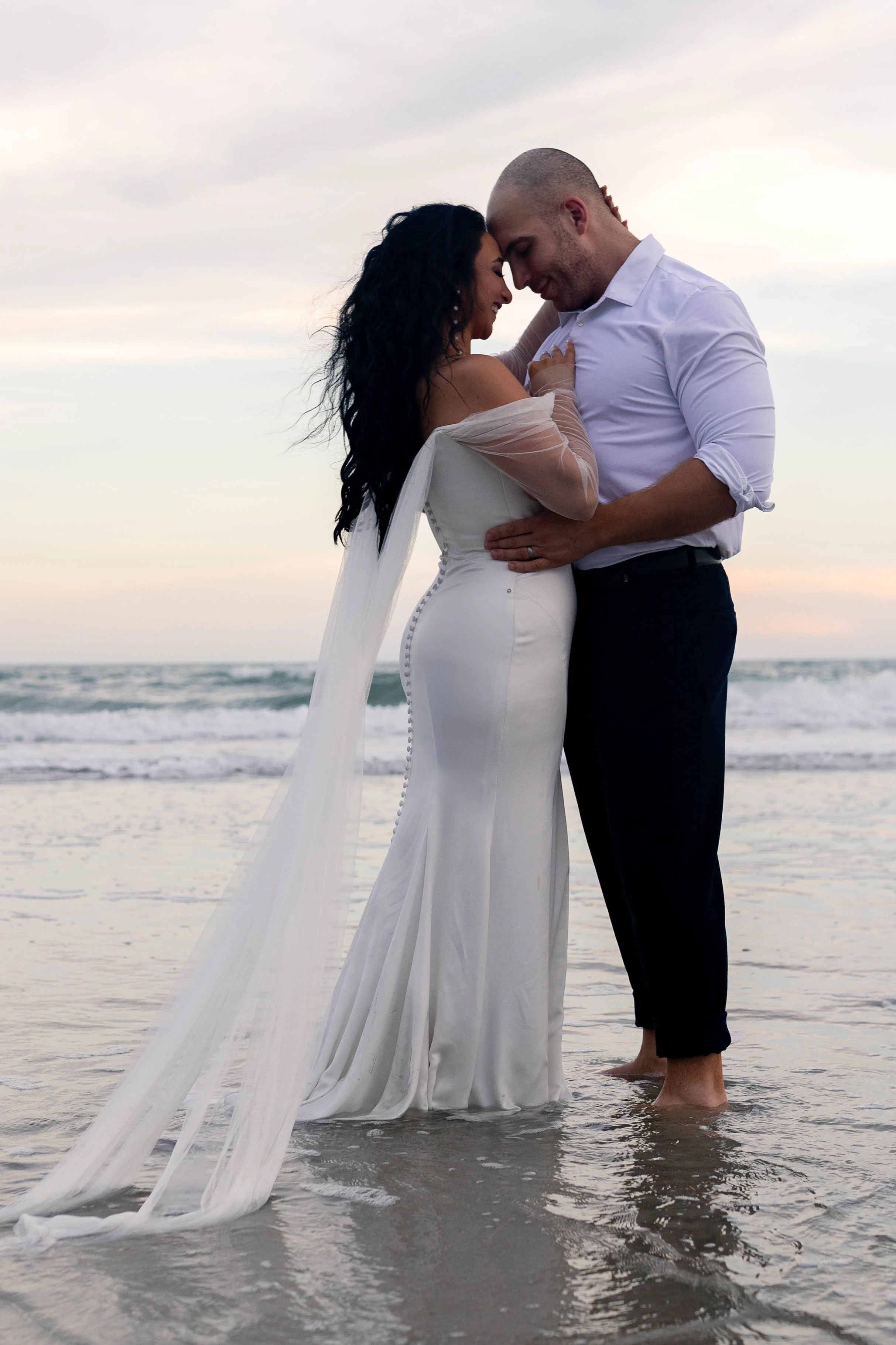 romantic couples wedding photos on the beach at sunset myrtle beach South Carolina