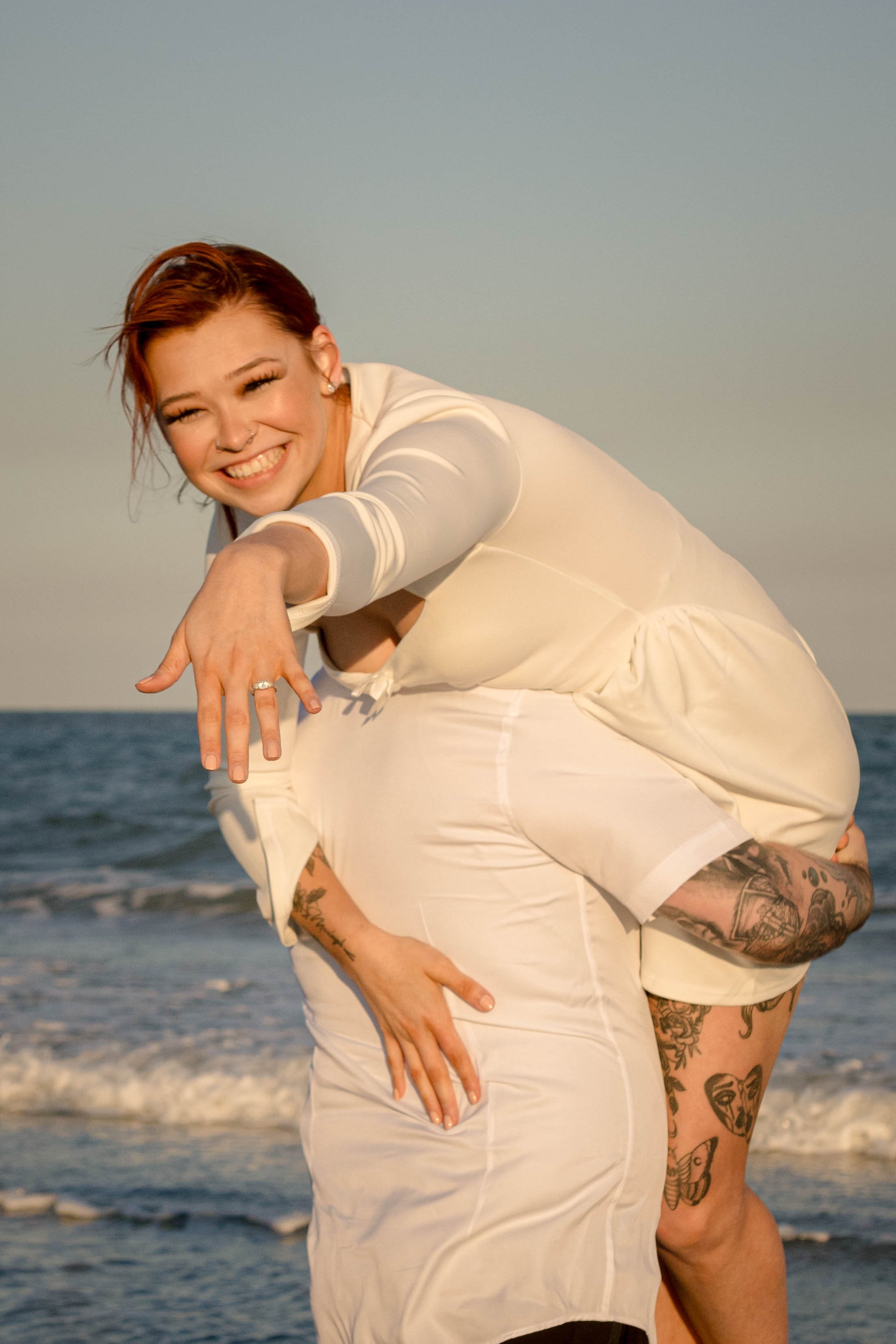 Creative couples portrait in dreamy golden light on Myrtle Beach shoreline