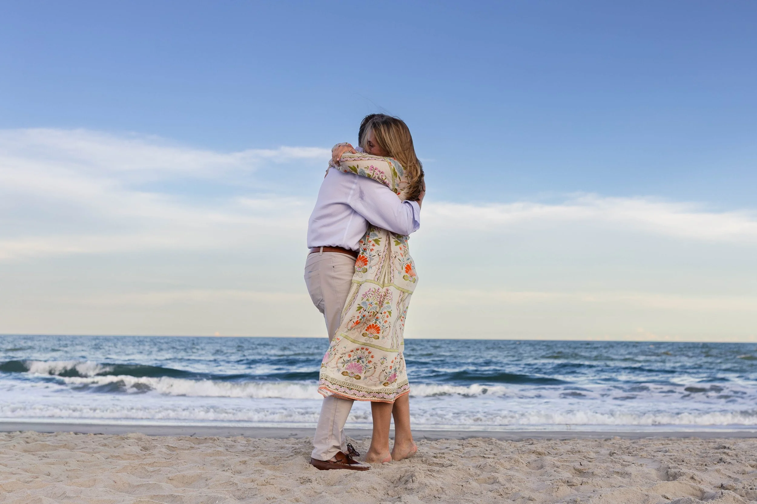 Pawleys Island proposal photography featuring a romantic beach engagement, champagne celebration