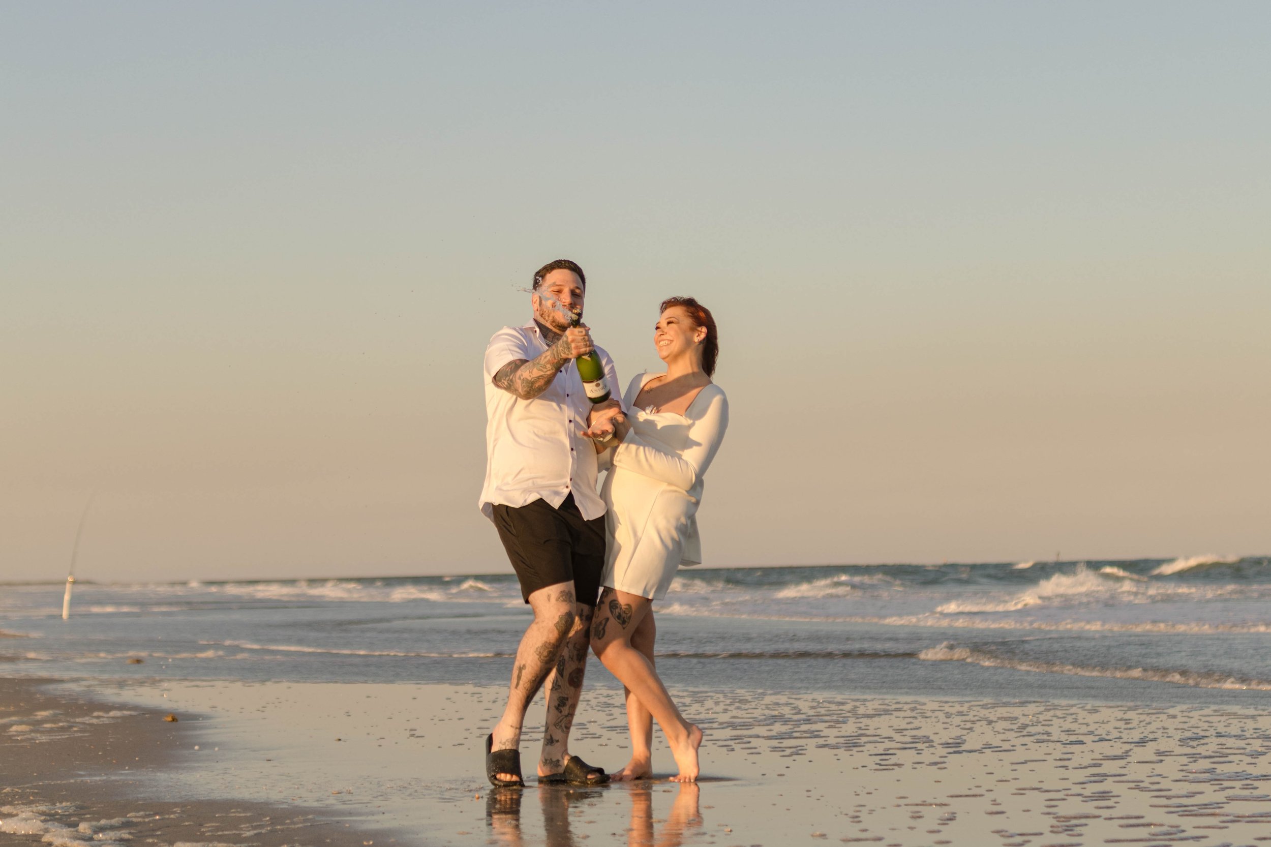 Creative couples portrait in dreamy golden light on Myrtle Beach shoreline