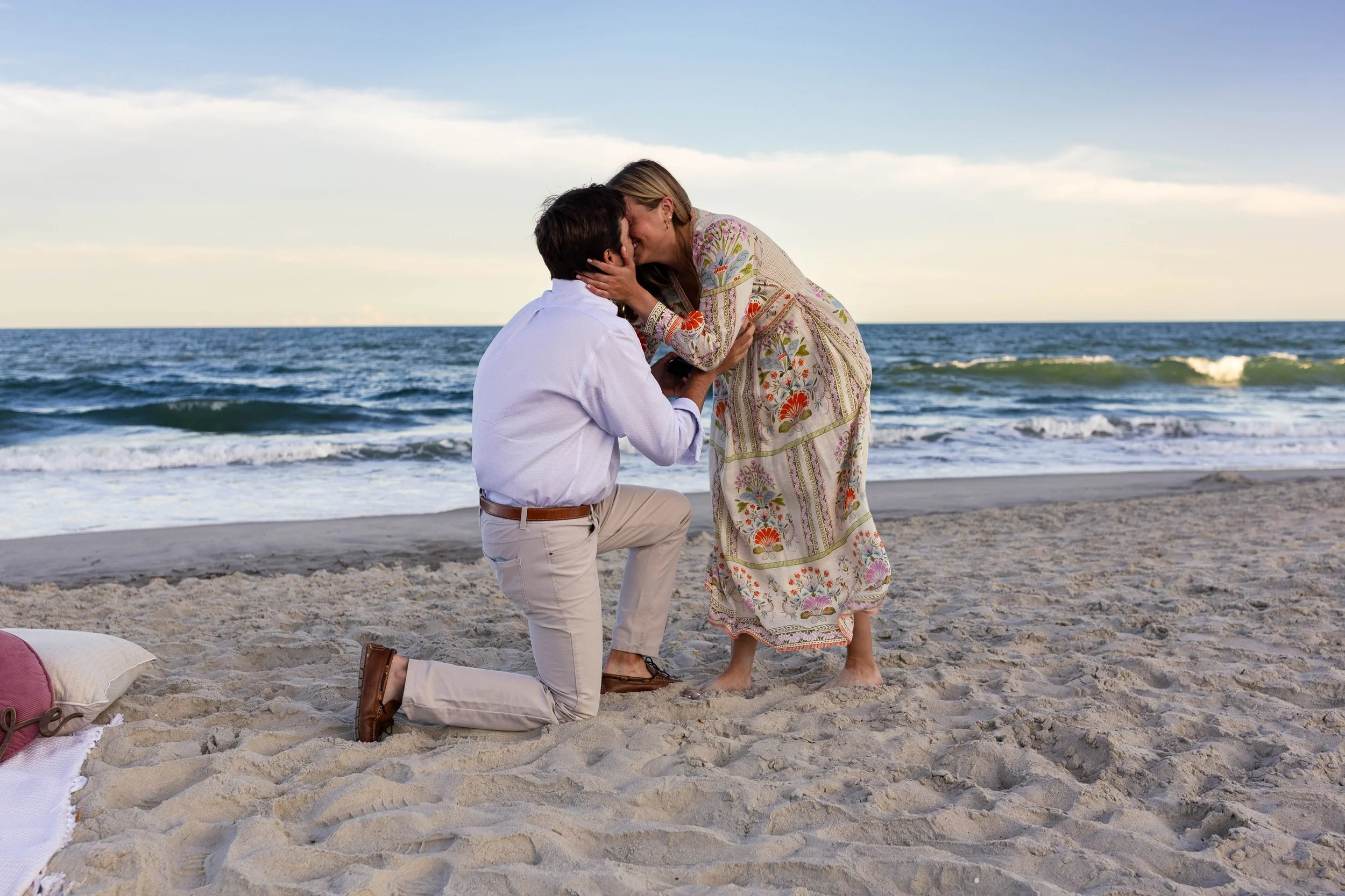 Pawleys Island proposal photography featuring a romantic beach engagement, champagne celebration