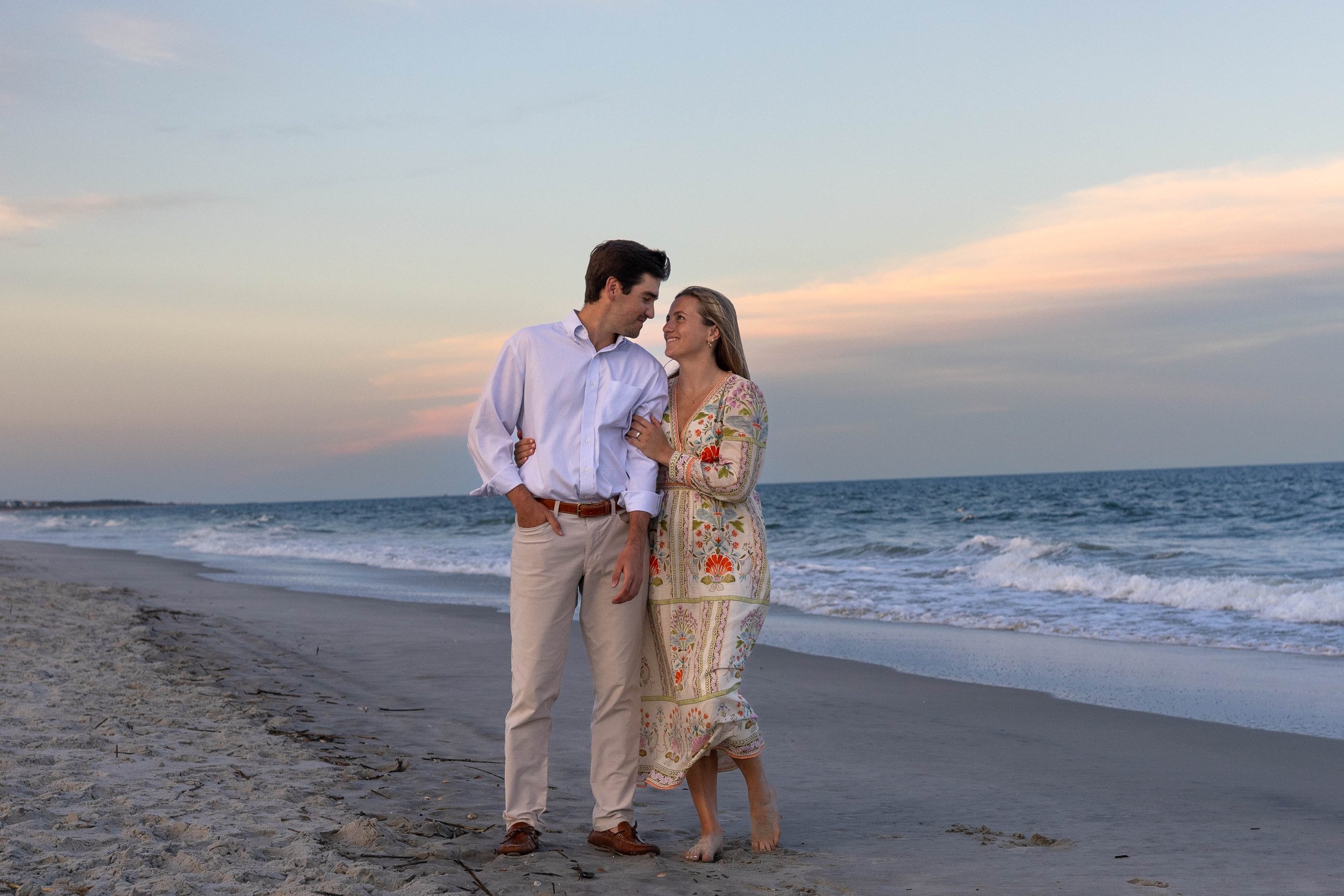 Pawleys Island proposal photography featuring a romantic beach engagement, champagne celebration