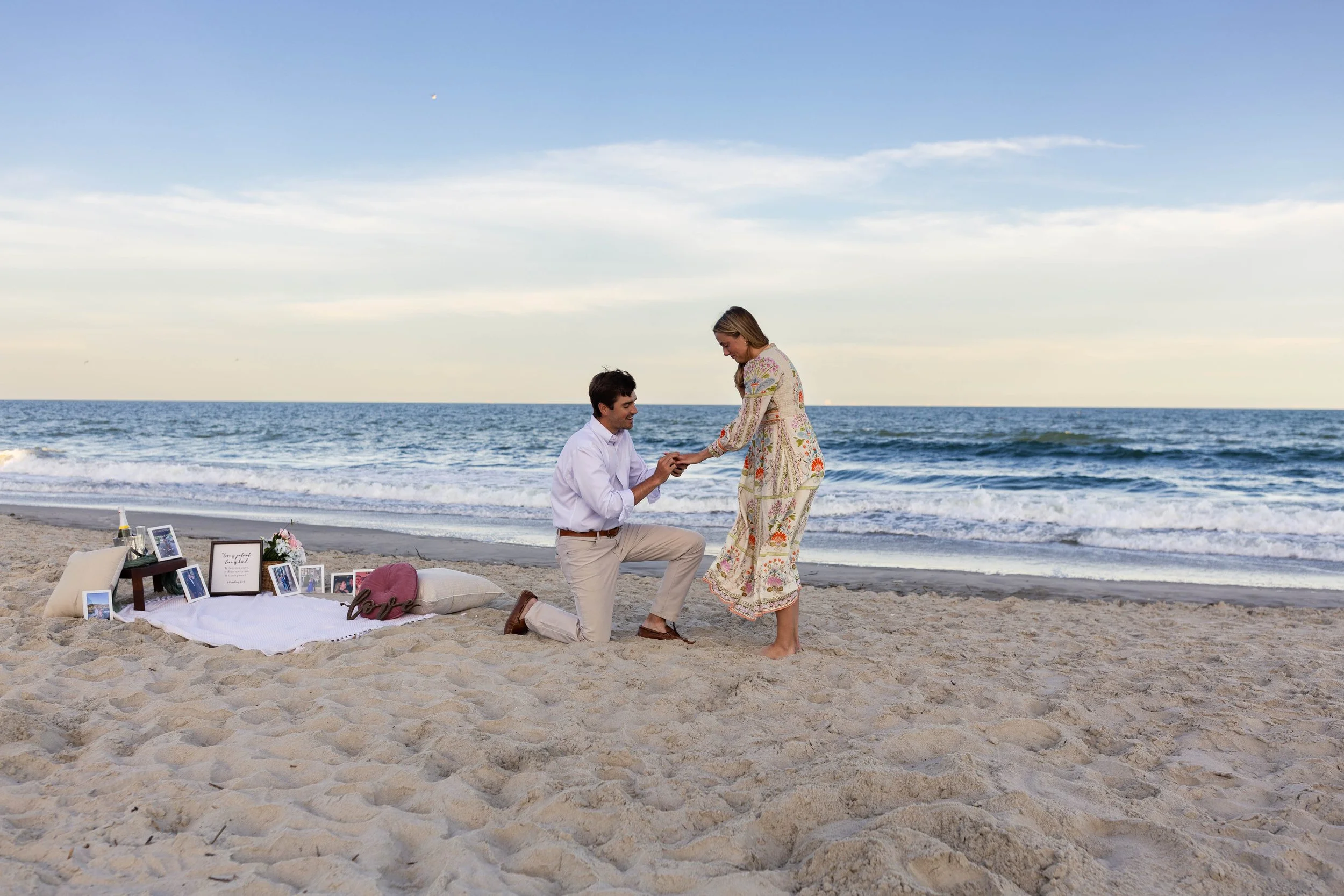 Pawleys Island proposal photography featuring a romantic beach engagement, champagne celebration