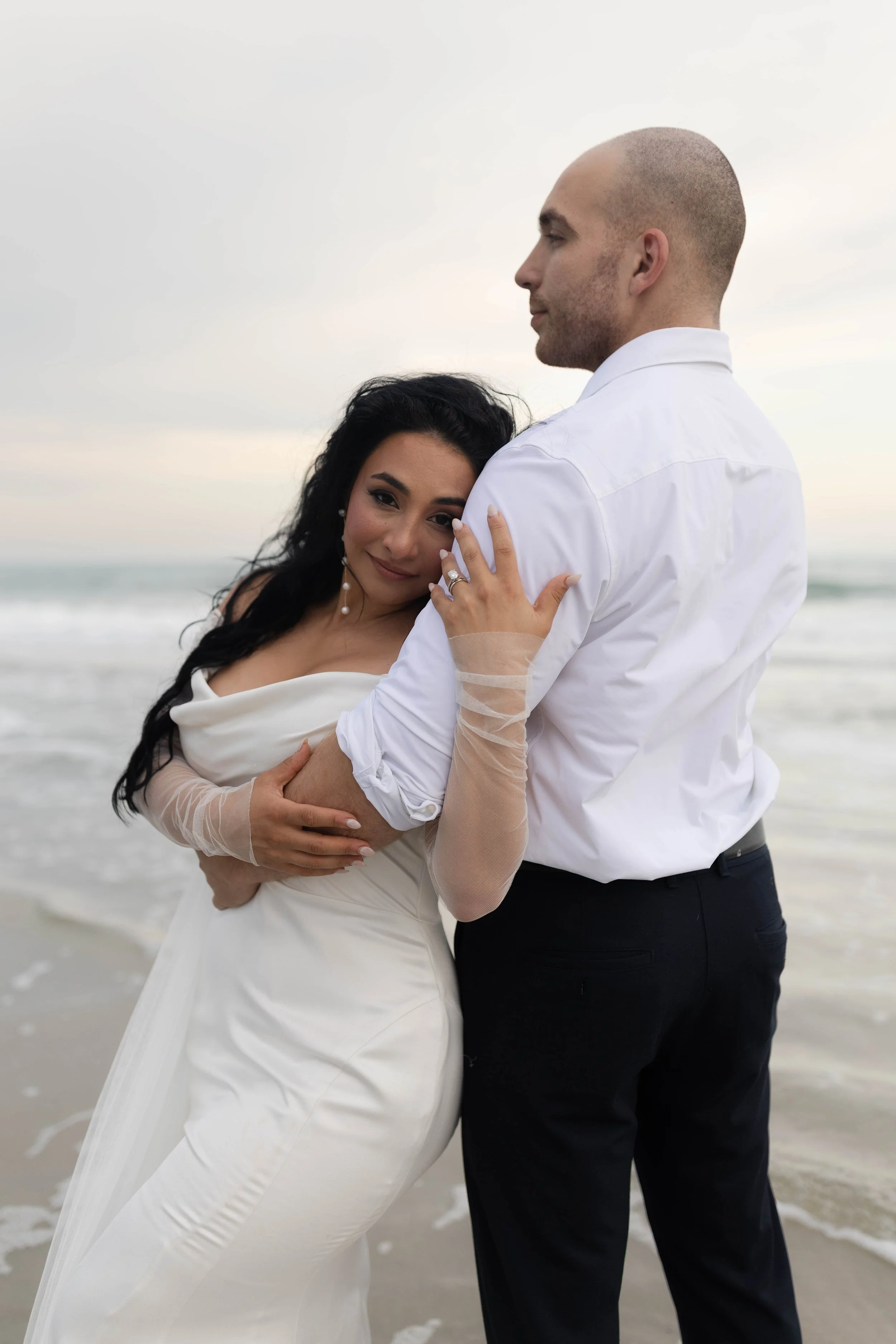 romantic couples wedding photos on the beach at sunset myrtle beach South carolina