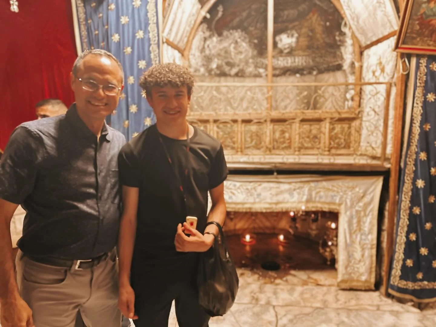 My son Luke &amp; I in Bethlehem at the spot where Jesus was born! From our Holy Land pilgrimage last month. We were blessed to walk right down to the crypt in the Church of the Nativity and pray at this sacred site with no crowds or lines&mdash;it&r