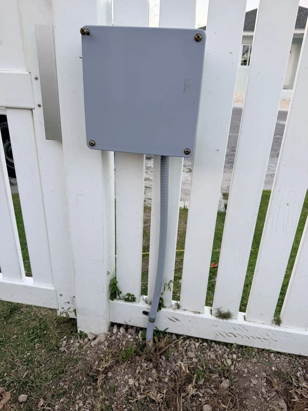 Weatherproof junction box and conduit for an automated gate system