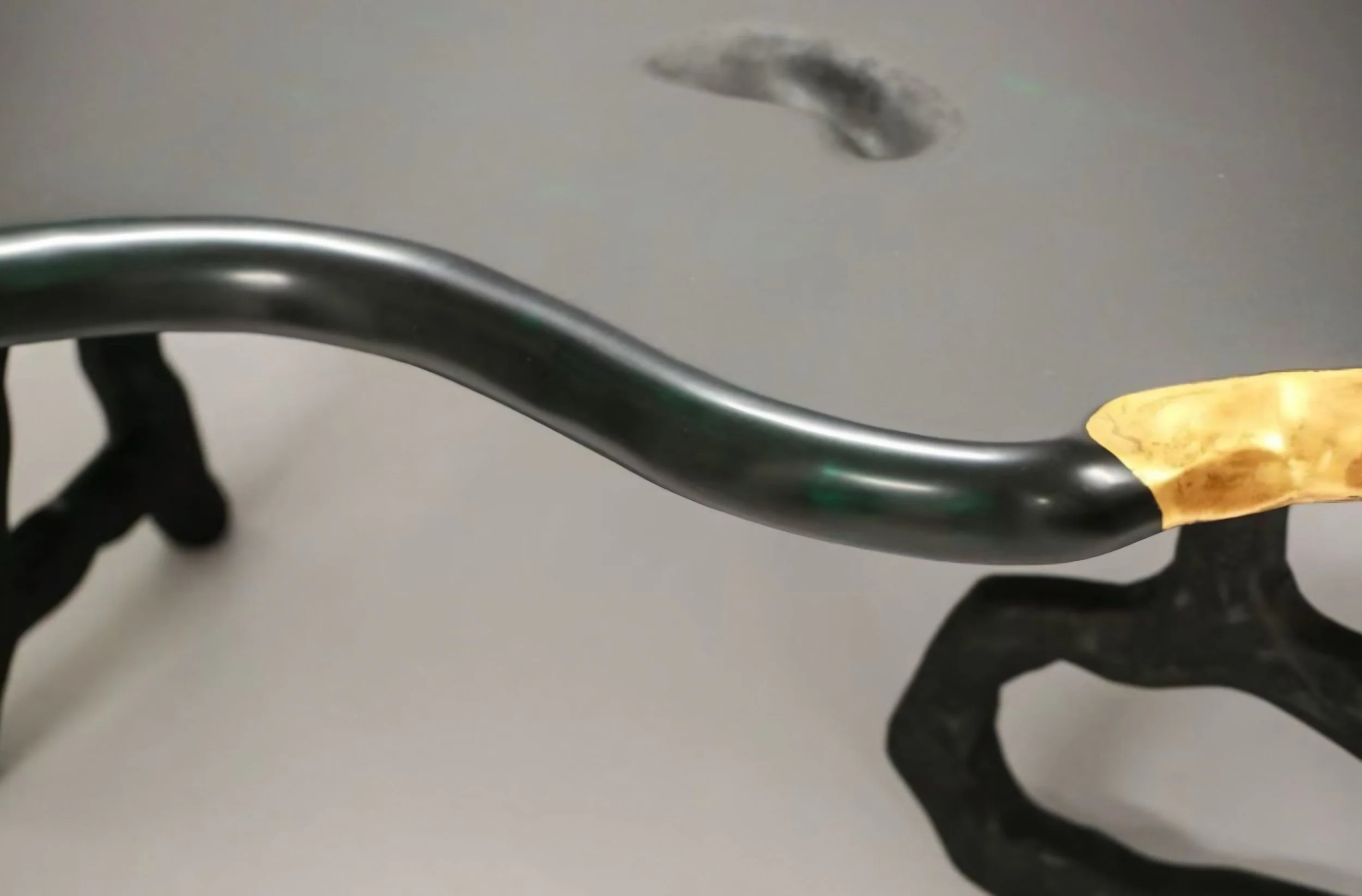 Detail of gold leaf finish on lacquer surface by Jiaying Xu