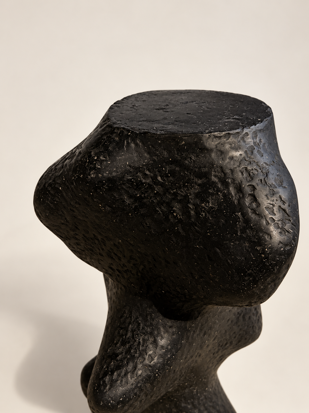 Top detail of Pedestal III sculptural pedestal in recycled paper pulp