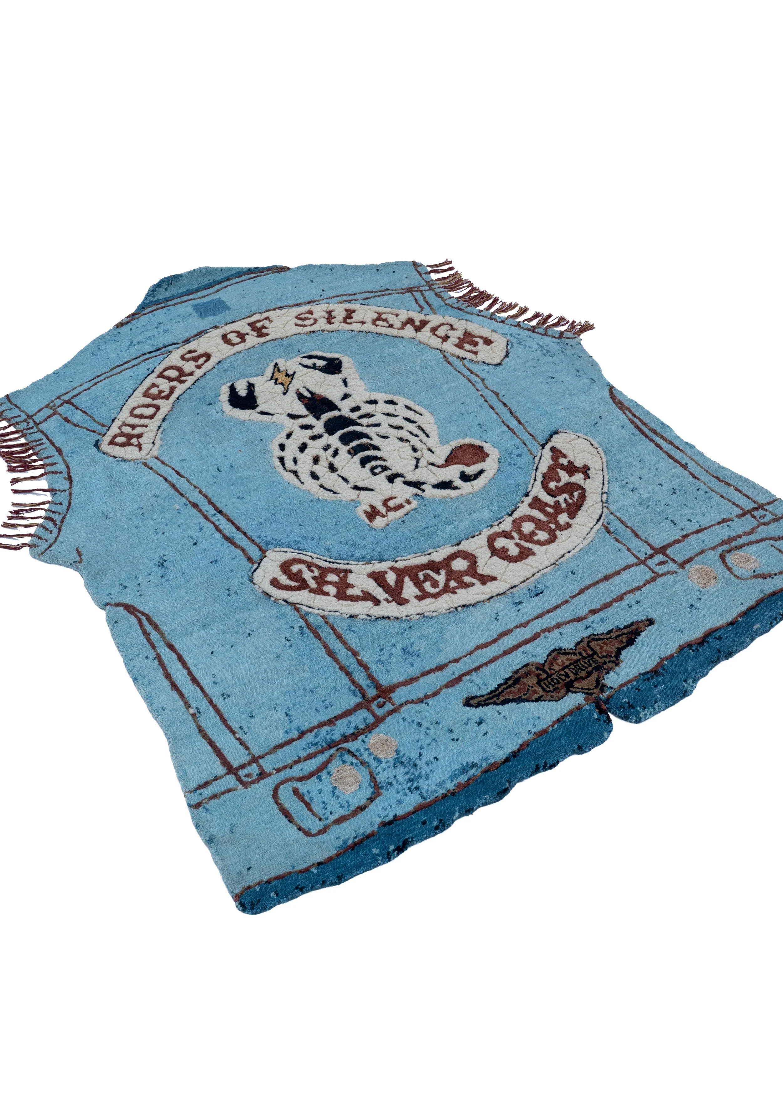 Shaped hand-knotted rug Riders of Silence by Julien Jaca: denim vest with scorpion, Silver Coast banner and winged Holy Driver badge